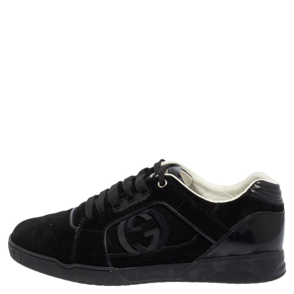 Coming with a classic low-top silhouette, these Gucci sneakers for men are a seamless combination of luxury, comfort, and style. They are made from smooth suede in a black shade. These sneakers are designed with the label's interlocking G logos on