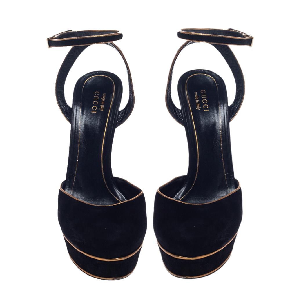 Keep your comfort at a maximum with these beautiful suede sandals. The platforms and high heels add style to your basic pair of sandals. These sandals from Gucci are one of a kind in trendy women's footwear. These black sandals are perfect for a