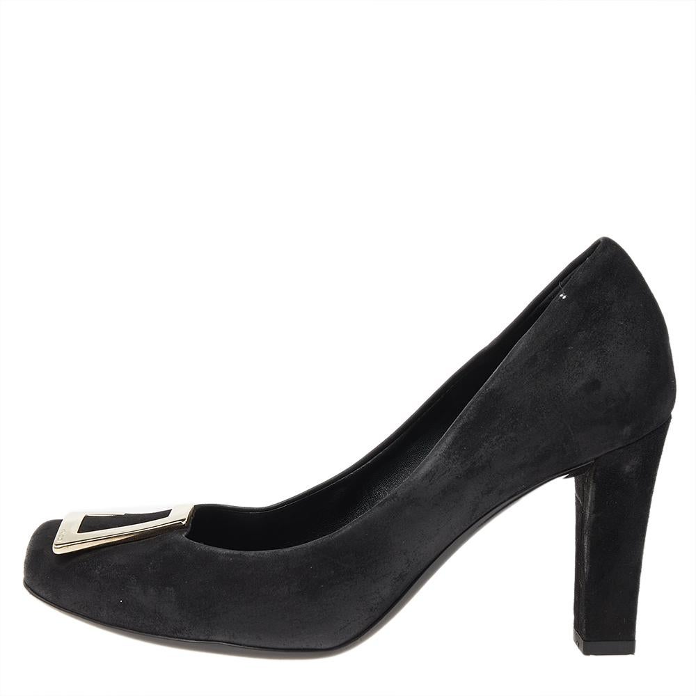 Gucci's timeless aesthetic and stellar craftsmanship in shoemaking is evident in these stunning pumps. Crafted from suede in a black shade, the square-toe silhouette is adorned with metal trim on the uppers. They have been raised on block heels.