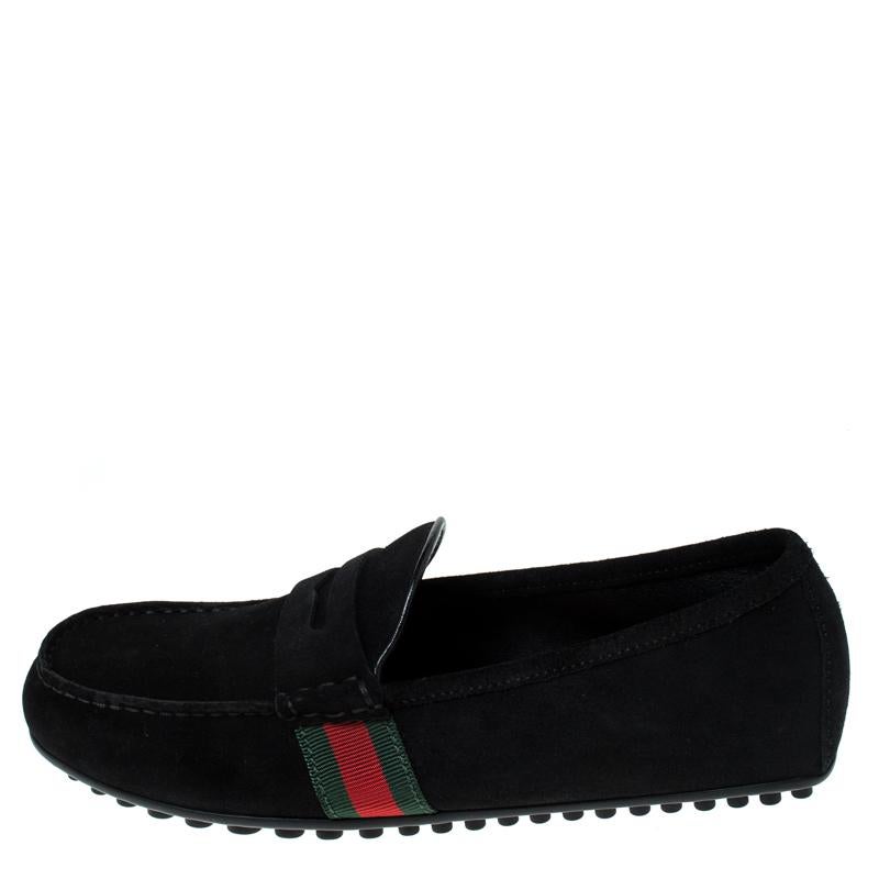 These Gucci loafers are well-made and so smart! They are covered in suede, detailed with web stripes and lined with leather on the insoles to provide soft comfort to your feet. They are easy to slip on and they are surely going to add luxury to your