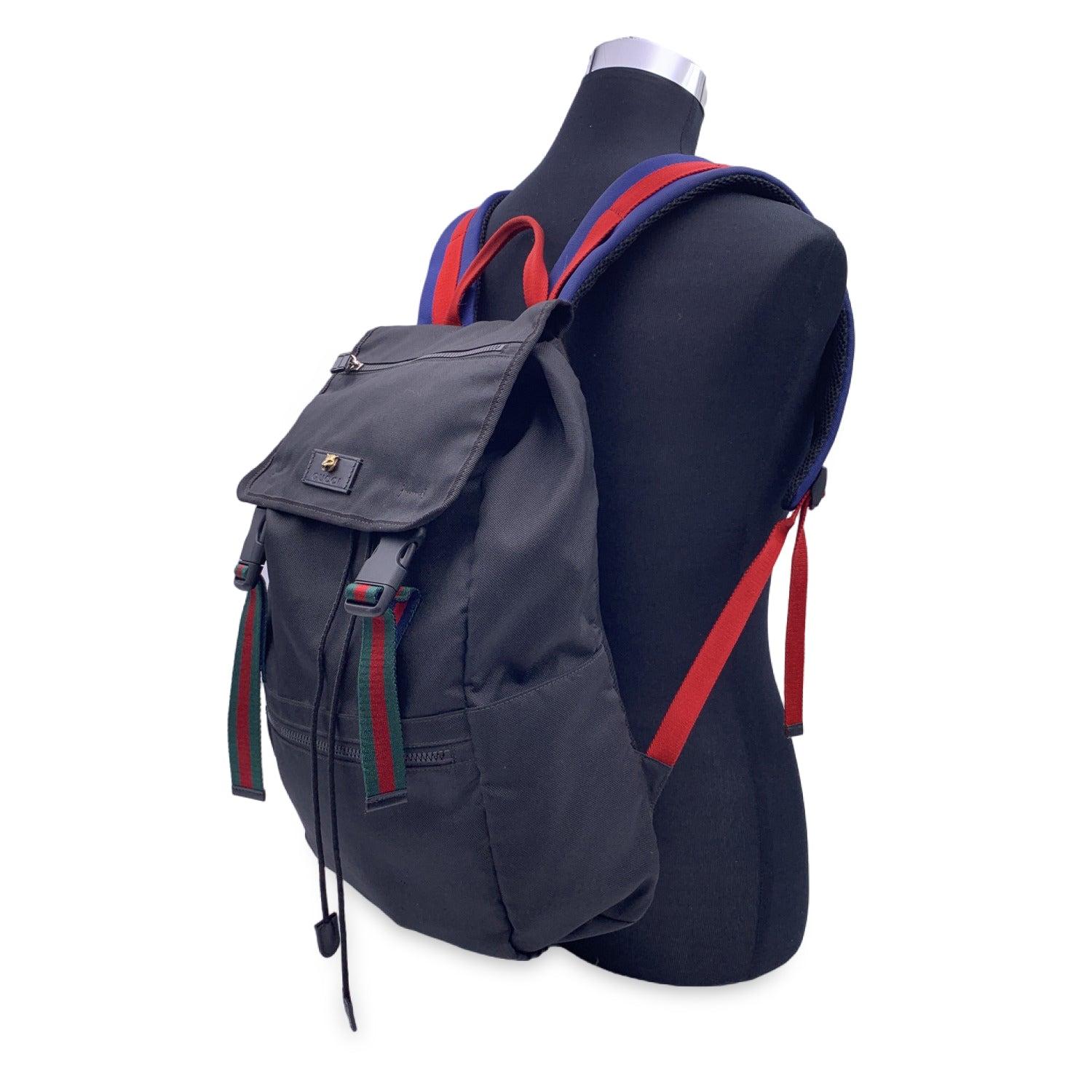 This beautiful Bag will come with a Certificate of Authenticity provided by Entrupy. The certificate will be provided at no further cost. Unisex Backpack by Gucci from the Sherry Line collection, crafted in durable black techno canvas. It features