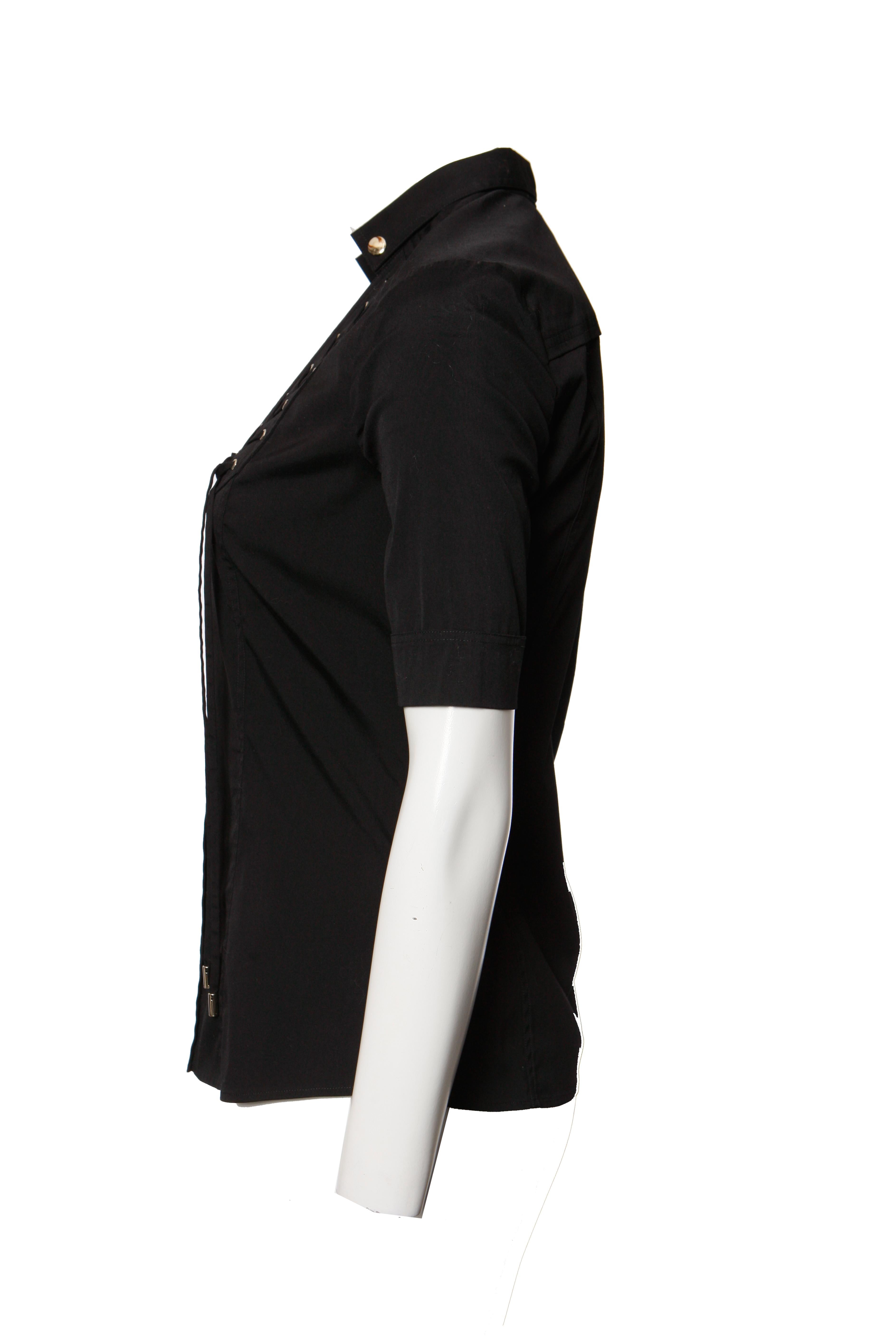 Gucci, Top negro con botones dorados. en Excelente estado para la venta en AMSTERDAM, NL