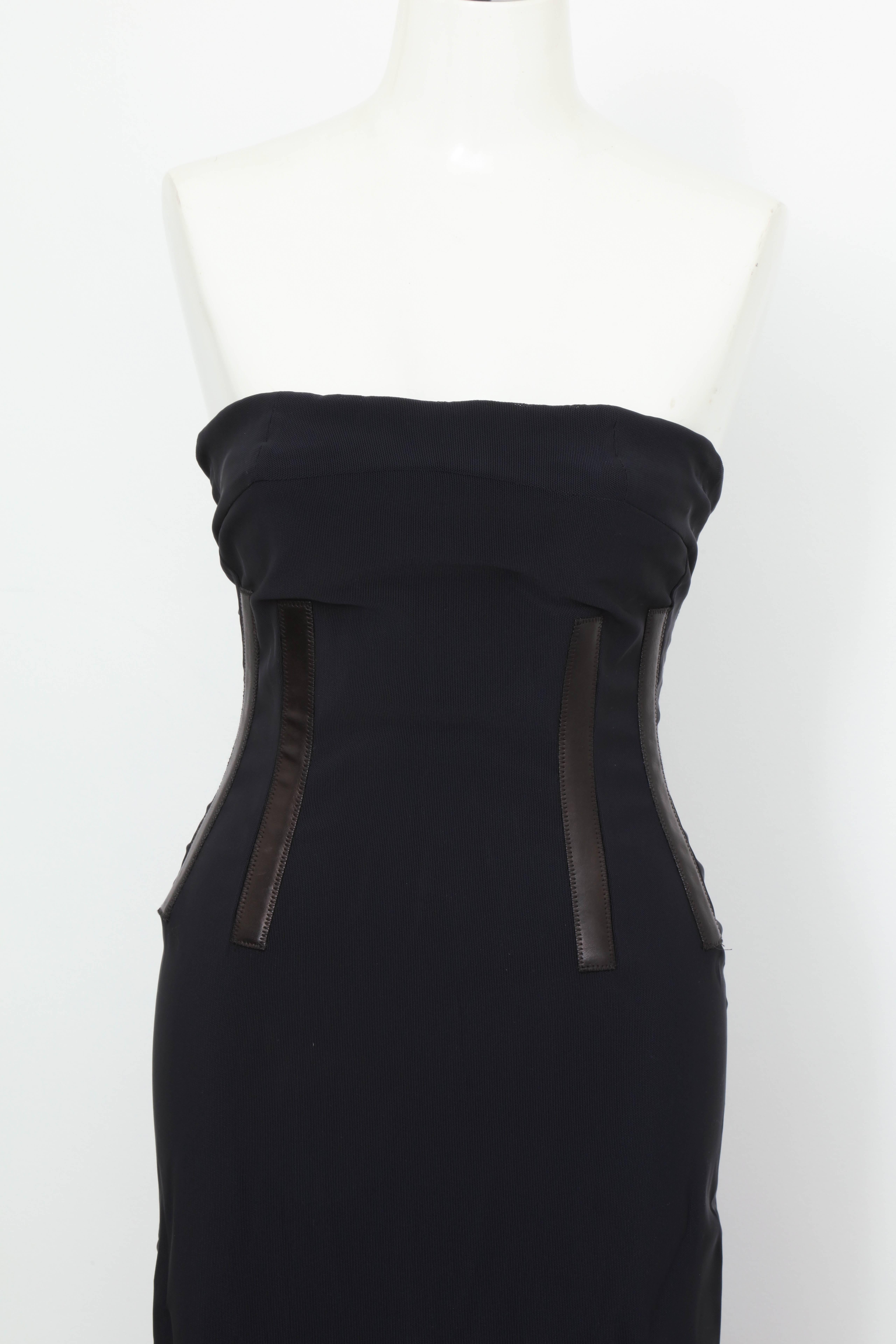 Beautiful Gucci black tube corset dress with leather inserts. Possibly by Tom Ford.

Size: 40, Fits like US 0-2