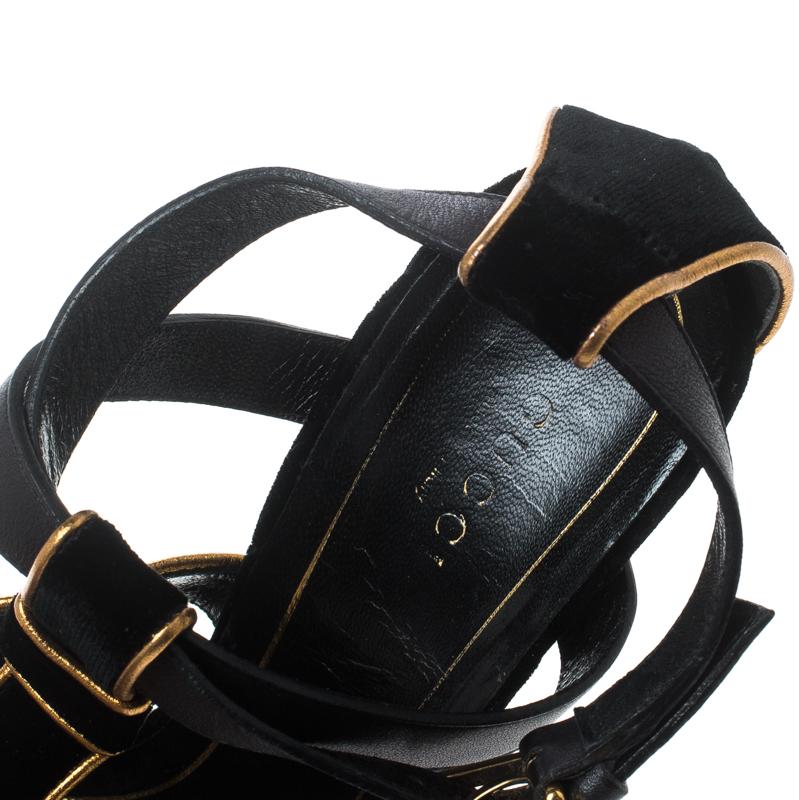 Bold, beautiful and very glamorous, these Malika sandals from Gucci are sure to make your heart skip a beat! The black beauties are crafted from leather and velvet and feature an open toe silhouette. They flaunt intertwined vamp straps and buckled