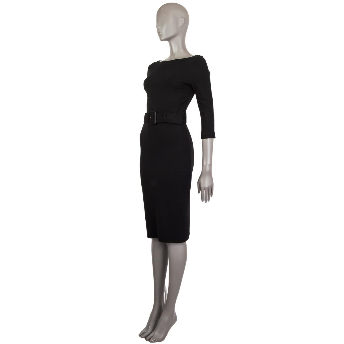 Gucci classic belted sheath dress in black missing tag probably (viscose blend) with a buckle belt at the waist, elegant fitted silhouette, boat neckline, 3/4 sleeve length, elastic fabric. Closes with a concealed zipper in the back. Lined in black