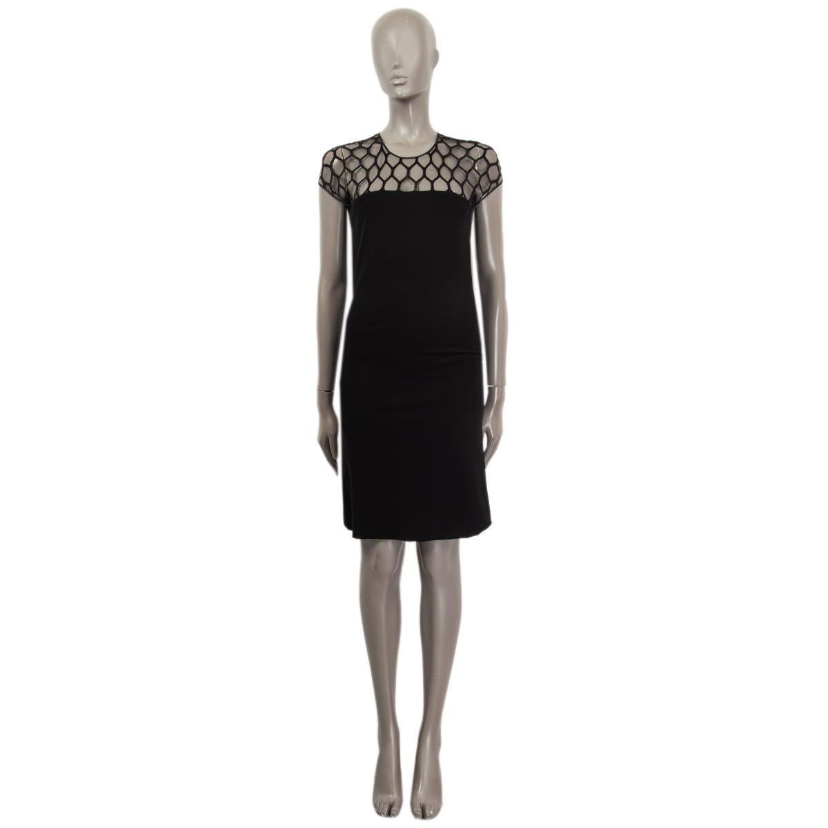 100% authentic Gucci sheath dress in black viscose (98%) and elastane (2%) with net-lace shoulder part. Opens with a zipper on the back. Unlined. Has been worn and is in excellent condition. 

Measurements
Tag Size	S
Size	S
Shoulder Width	42cm