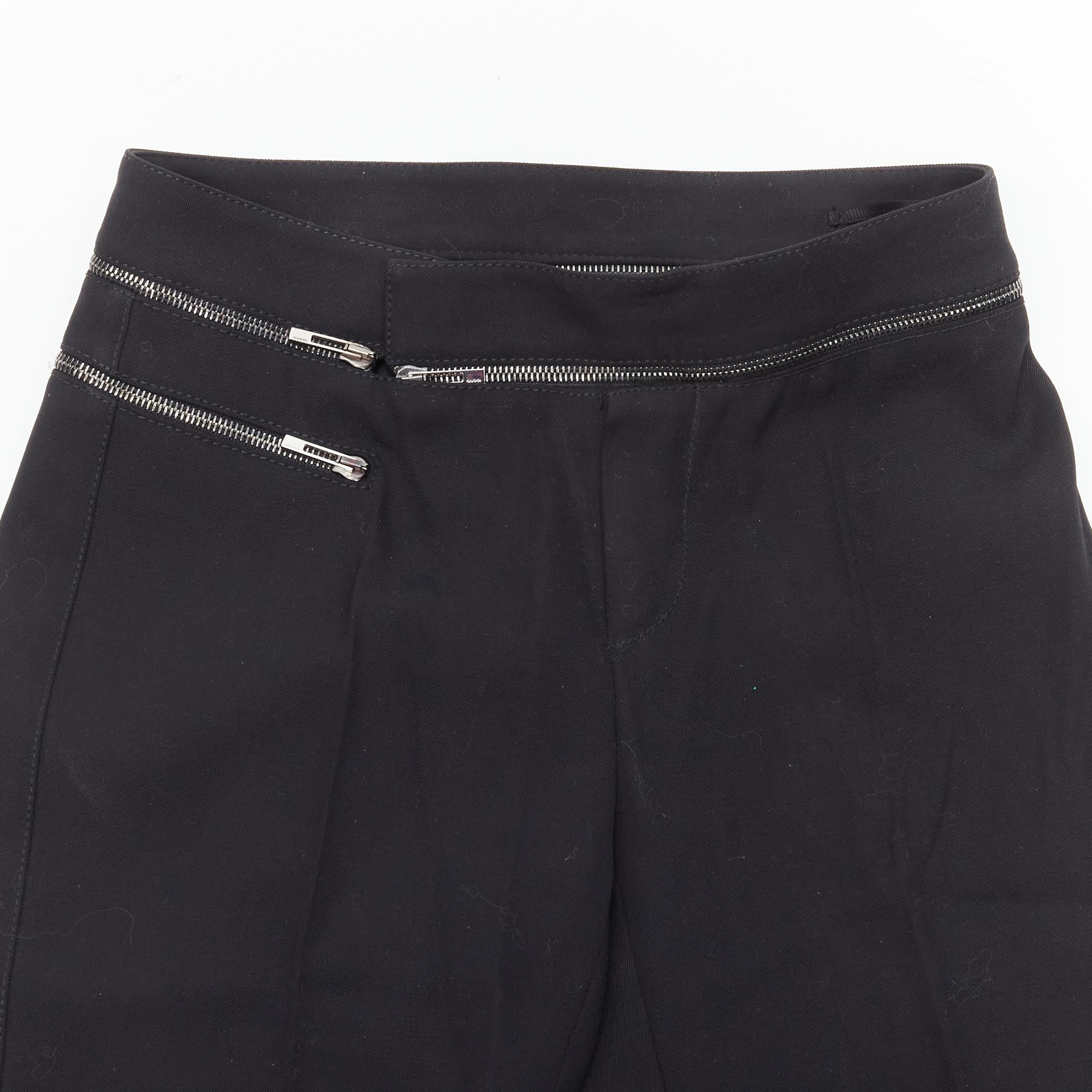 GUCCI black viscose silver waist trim straight leg trousers IT38 XS 
Reference: ANWU/A00549 
Brand: Gucci 
Material: Wool 
Color: Black 
Pattern: Solid 
Closure: Zip 
Extra Detail: Zip around detailing along waist band. Side zip pockets. 
Made in: