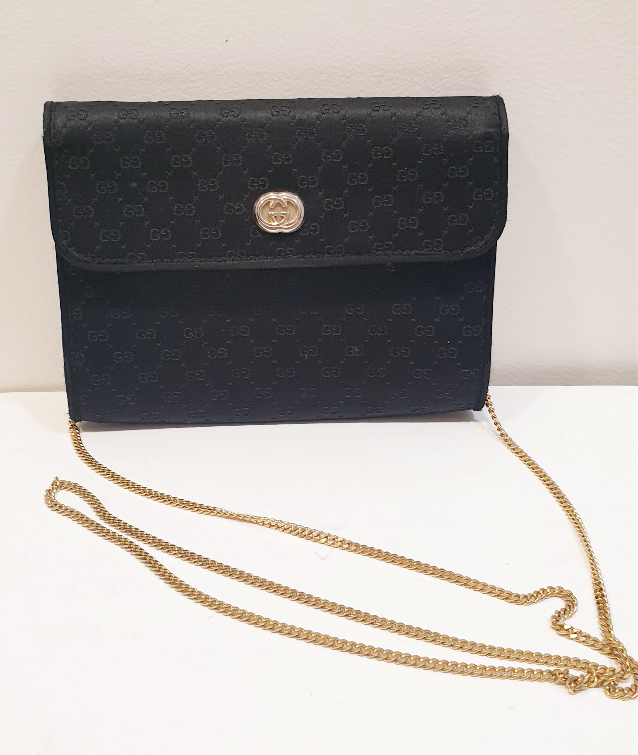 gucci black purse with gold chain