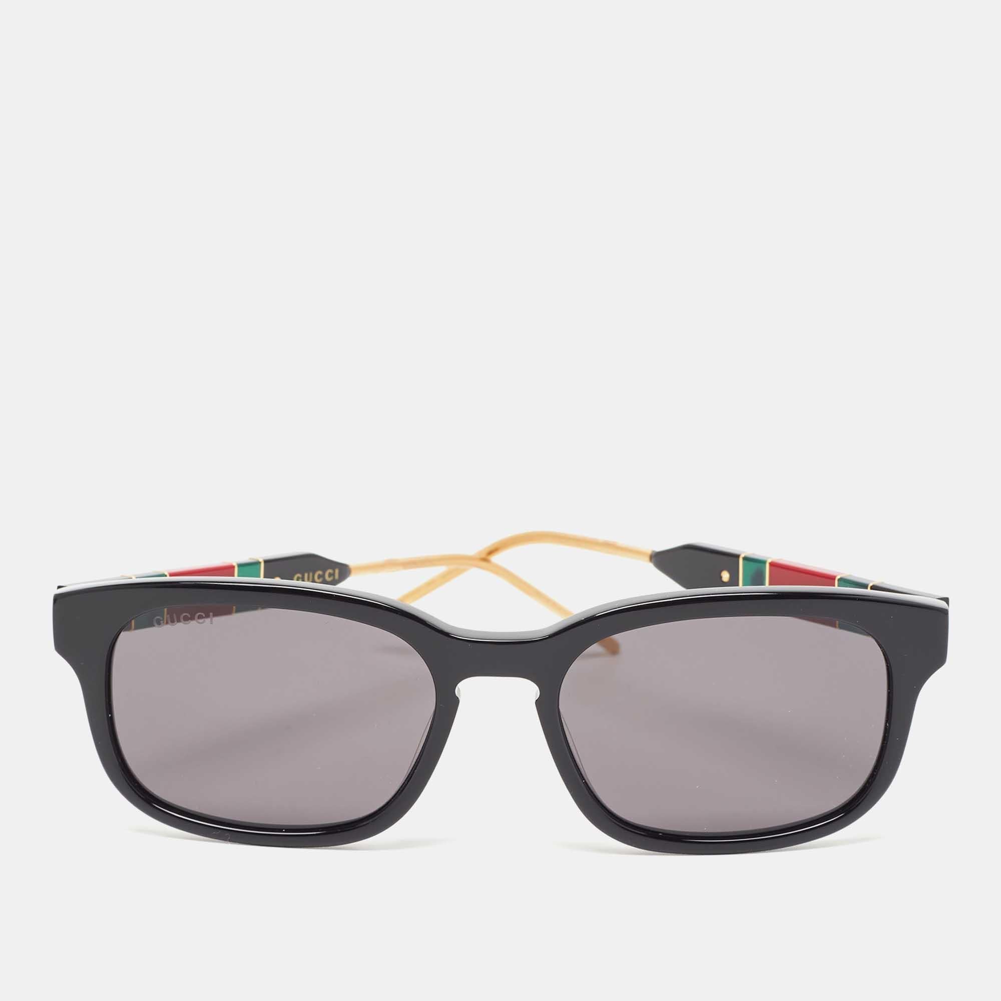Embrace sunny days in full style with the help of this pair of Gucci sunglasses. Created with expertise, the luxe sunglasses feature a well-designed frame and high-grade lenses that are equipped to protect your eyes.

Includes: Original Dustbag,