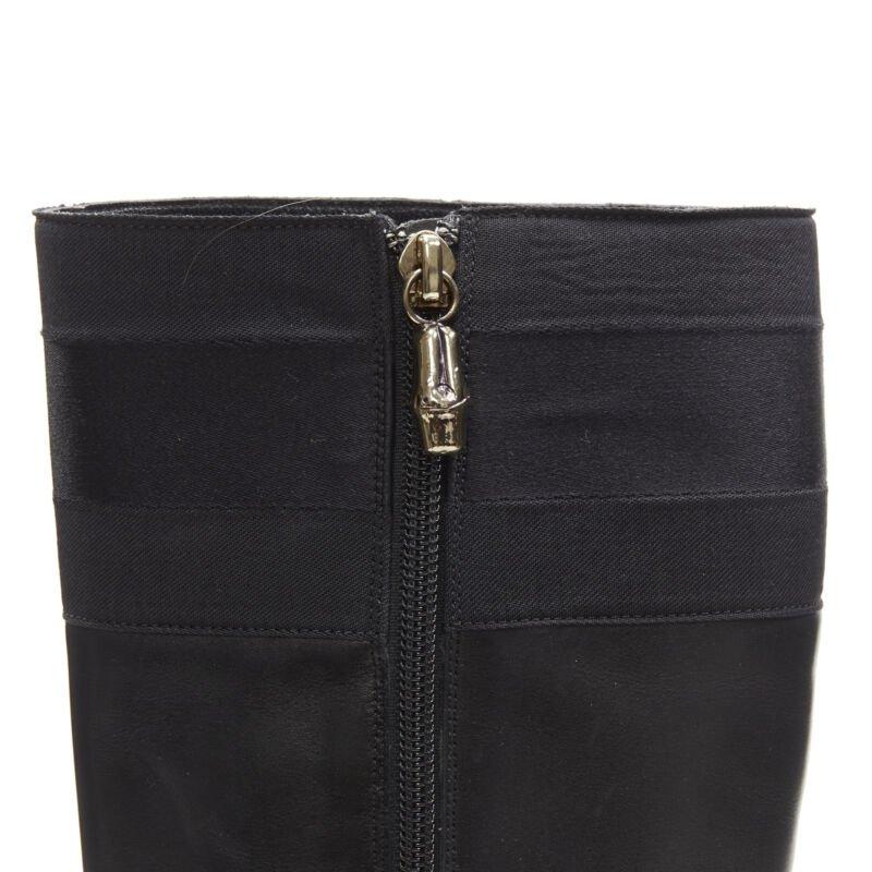 GUCCI stivali con zip in pelle nera con finiture in rete e charm in bambù oro EU36
Riferimento: ANWU/A00982
Marchio: Gucci
Materiale: Pelle
Colore: nero
Modello: Tinta unita
Chiusura: zip
Fodera:  Pelle
Dettagli extra: Chiusura lampo in bambù
