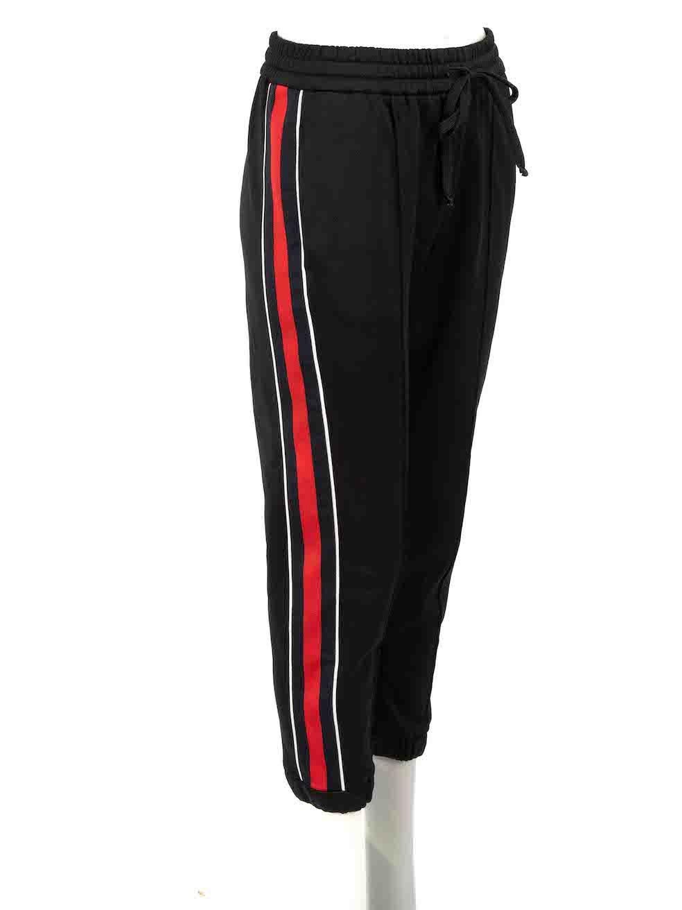 CONDITION is Very good. Hardly any visible wear to trousers is evident on this used Gucci designer resale item.

Details
Black
Polyester
Track tapered trousers
Webbing stripe tape detail
High rise
Elasticated with drawstring
Elasticated leg hem
Made