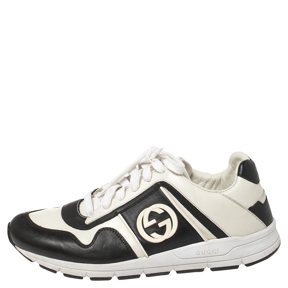 Adorned with signature details, these Gucci sneakers are rendered in leather and are designed in a low-cut style with lace-up vamps and detailing of the iconic GG logo. The monochrome look ensures they are easily coordinated with your casuals,