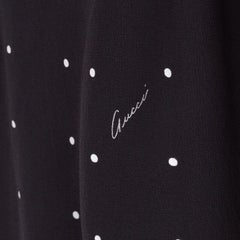 GUCCI Schwarzweißes Minikleid mit Tupfenmuster und cursivem Logodruck auf der Vorderseite IT38 XS