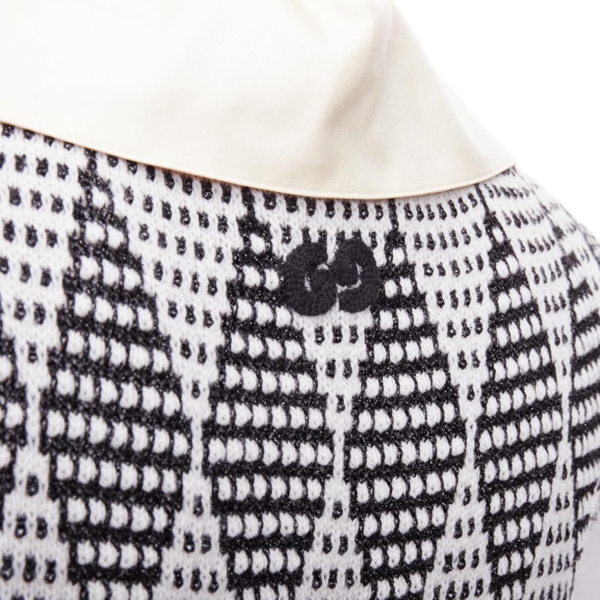 GUCCI black white wool GG lurex argyle knit vest S
Reference: NKLL/A00285
Brand: Gucci
Designer: Alessandro Michele
Material: Wool, Blend
Color: Black, Cream
Pattern: Argyle/Diamond
Closure: Slip On
Extra Details: Collar is detachable.
Made in: