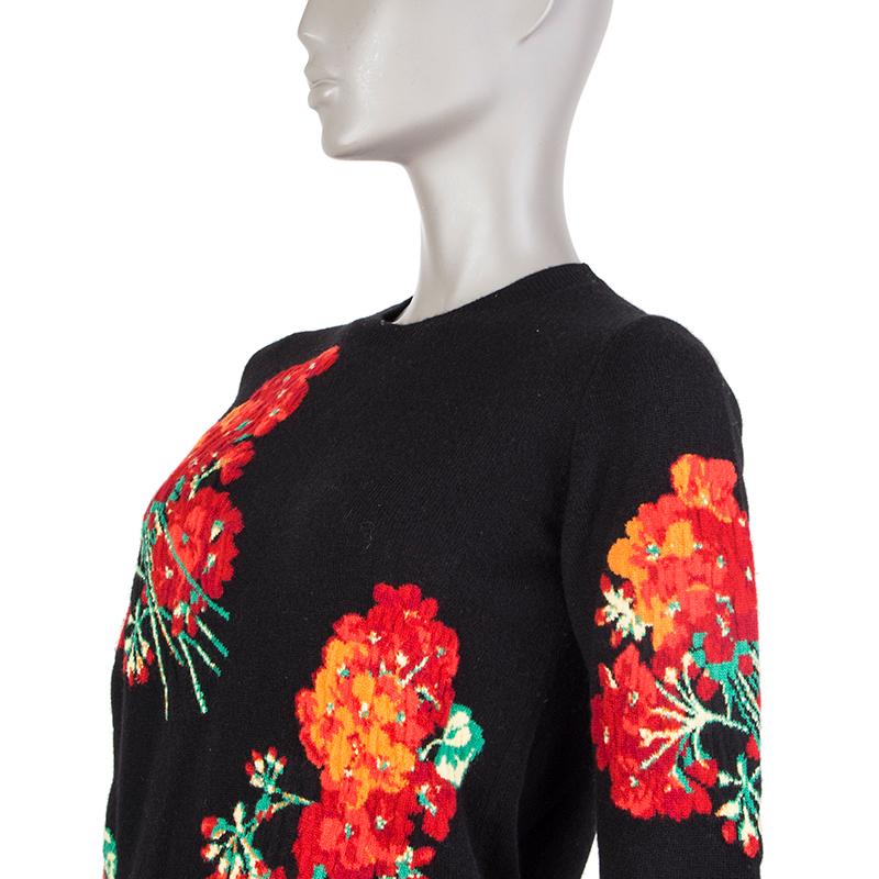 Gucci knitted flower sweater in black, red, orange, white, and green wool (missing tag). Unlined. Has been worn and is in excellent condition.

Tag Size S
Size S
Shoulder Width 35cm (13.7in)
Bust 86cm (33.5in) to 96cm (37.4in)
Waist 96cm (37.4in) to