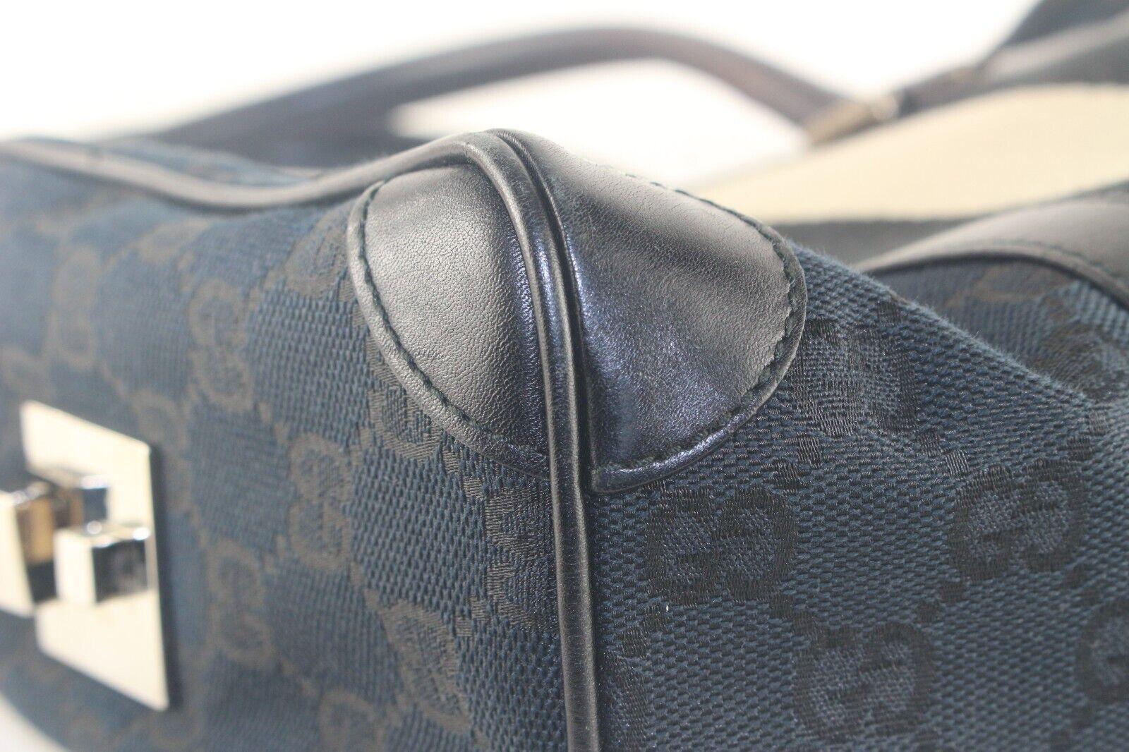 Gucci Black x White Monogram GG Boston Bag Joy Shoulder 4GK925K In Fair Condition For Sale In Dix hills, NY