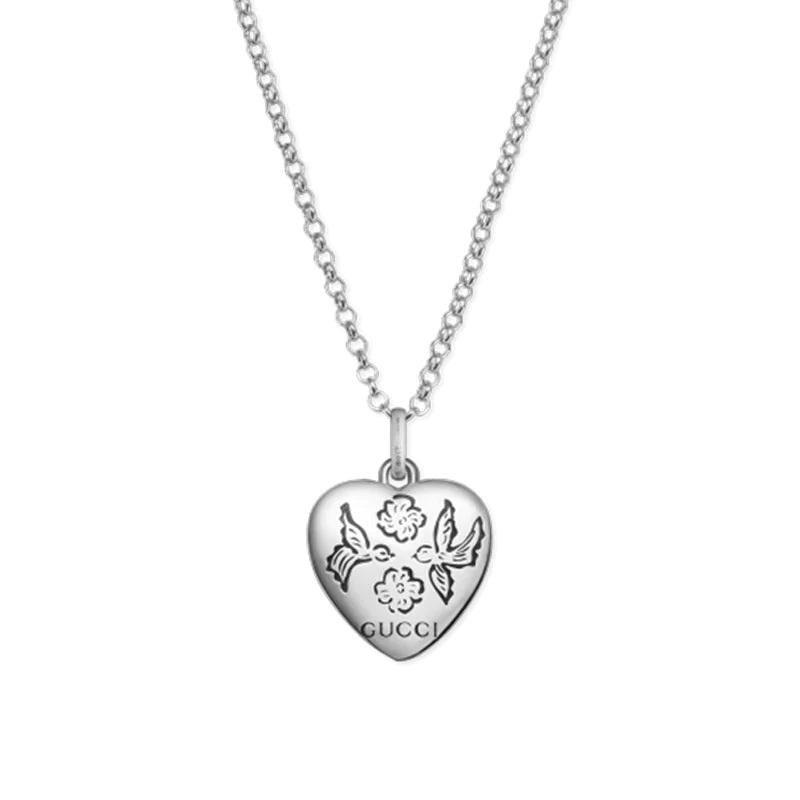 Gucci Blind For Love Sterling Silver Engraved Heart Necklace YBB455542001

Featuring the iconic and symbolic Gucci motifs – the heart, the eye, flowers and birds - the Blind for Love Pendant Necklace is the latest design brought to you from Gucci’s
