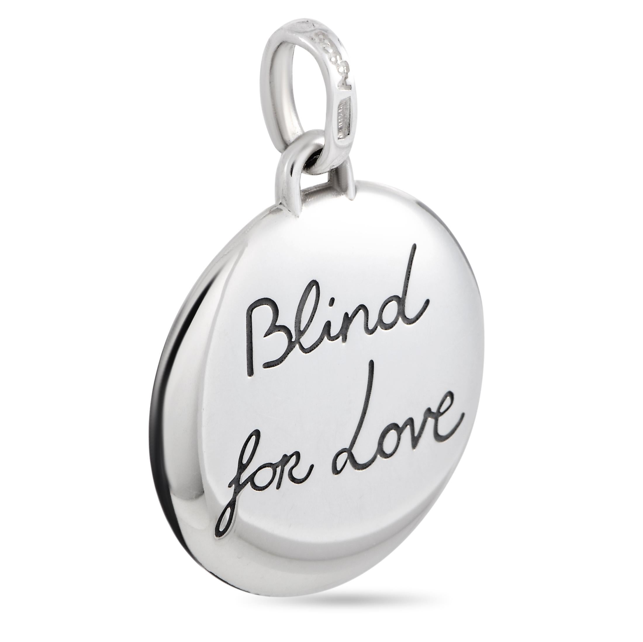 The Gucci “Blind For Love” charm is made of sterling silver with aureco black finish and weighs 8 grams. The charm measures 1” in length and 0.88” in width.
 
 This item is offered in brand new condition and includes the manufacturer’s box and