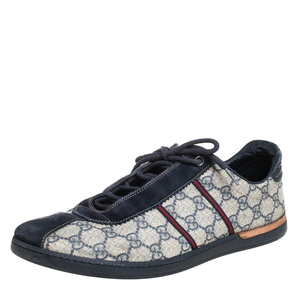These Gucci sneakers are simple yet stylish. They've been crafted from Guccissima coated canvas and designed with suede trims as well as lace-ups. These blue & beige sneakers are just perfect to ace one's casual style.

