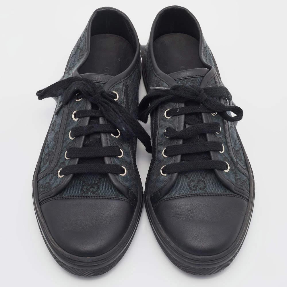 These timeless Gucci sneakers are simple yet stylish. They've been crafted from GG canvas and designed with leather as well as lace-ups on the vamps. Set on tough rubber soles, these sneakers are just perfect for acing one's casual style.

