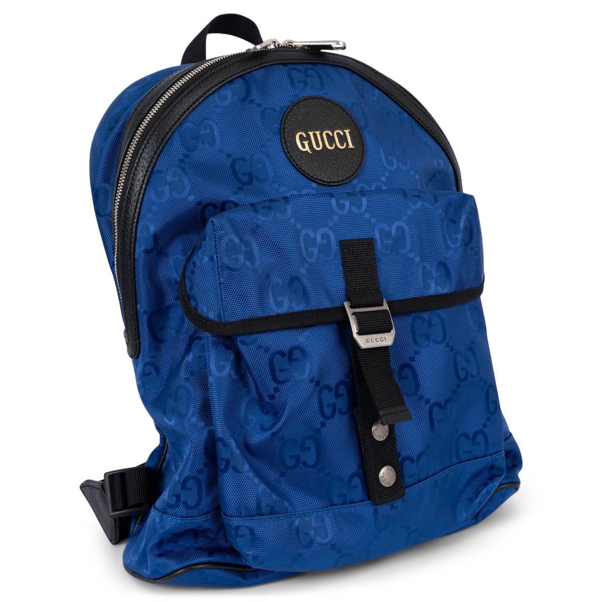 100% authentic Gucci Off the Grid backpack in royal blue ECONYL® canvas with black leather and nylon trim. The design features the classic monogram pattern, silver-tone hardware, logo patch to the front with gold-tone lettering, single top handle,