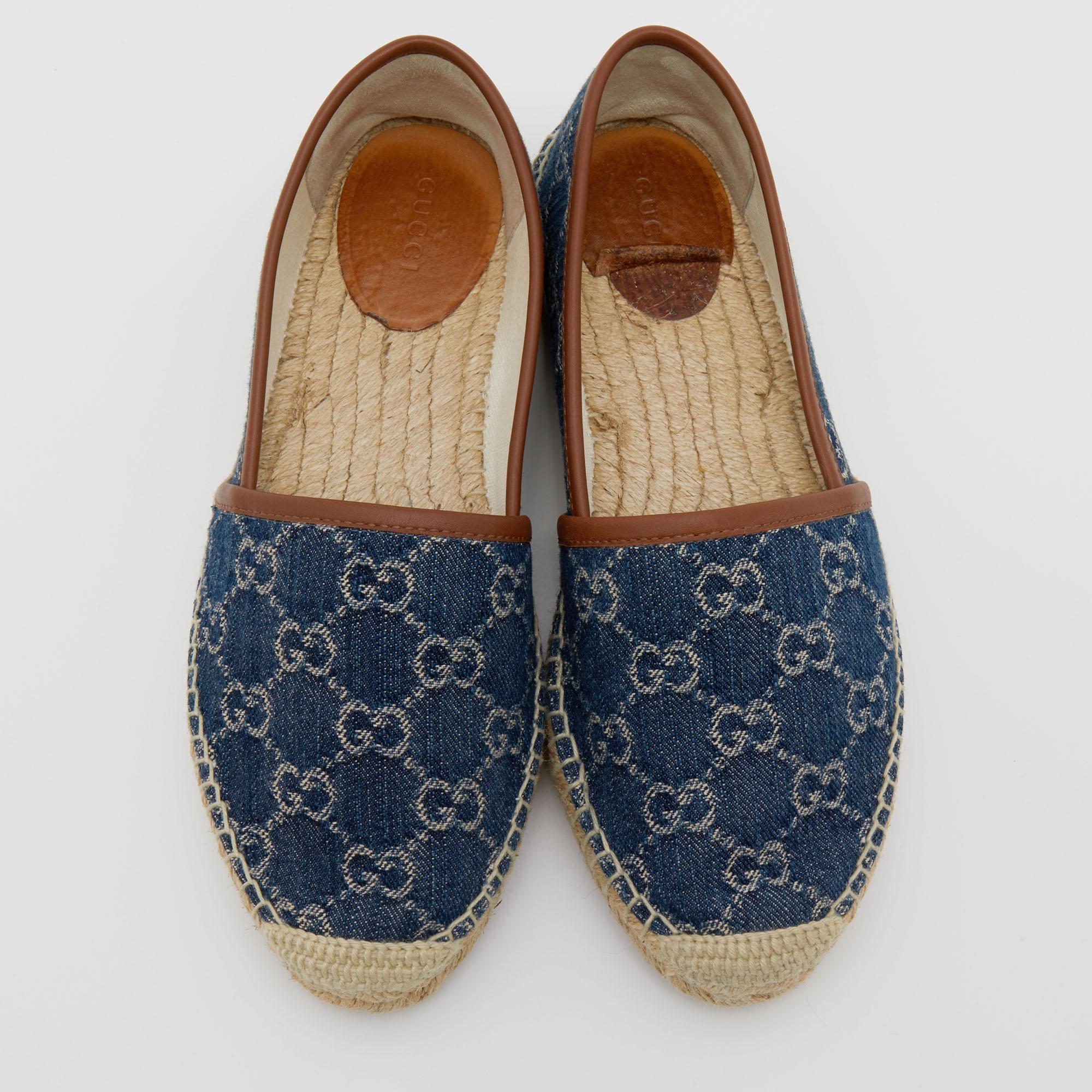 These espadrille flats in denim and leather are Gucci's interpretation of chic. Easy to slip into, this comfortable, blue-brown pair features smooth jute insoles and durable rubber soles perfect for regular use.

Includes: Original Dustbag, Original