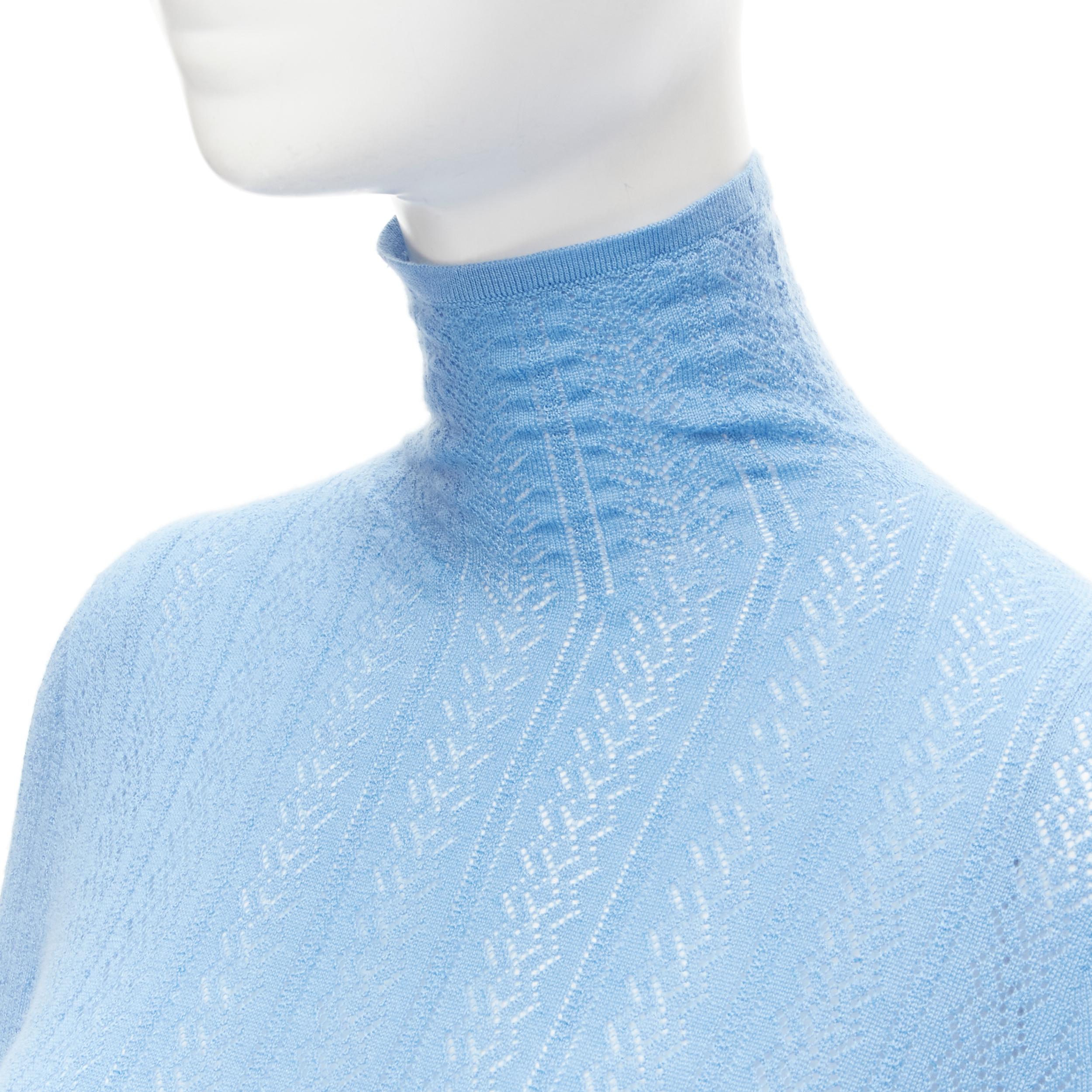 GUCCI blue cashmere silk intarsia fine knit turtleneck sweater tunic M 
Reference: MELK/A00049 
Brand: Gucci 
Material: Cashmere 
Color: Blue 
Pattern: Solid 
Made in: Italy 

CONDITION: 
Condition: Excellent, this item was pre-owned and is in