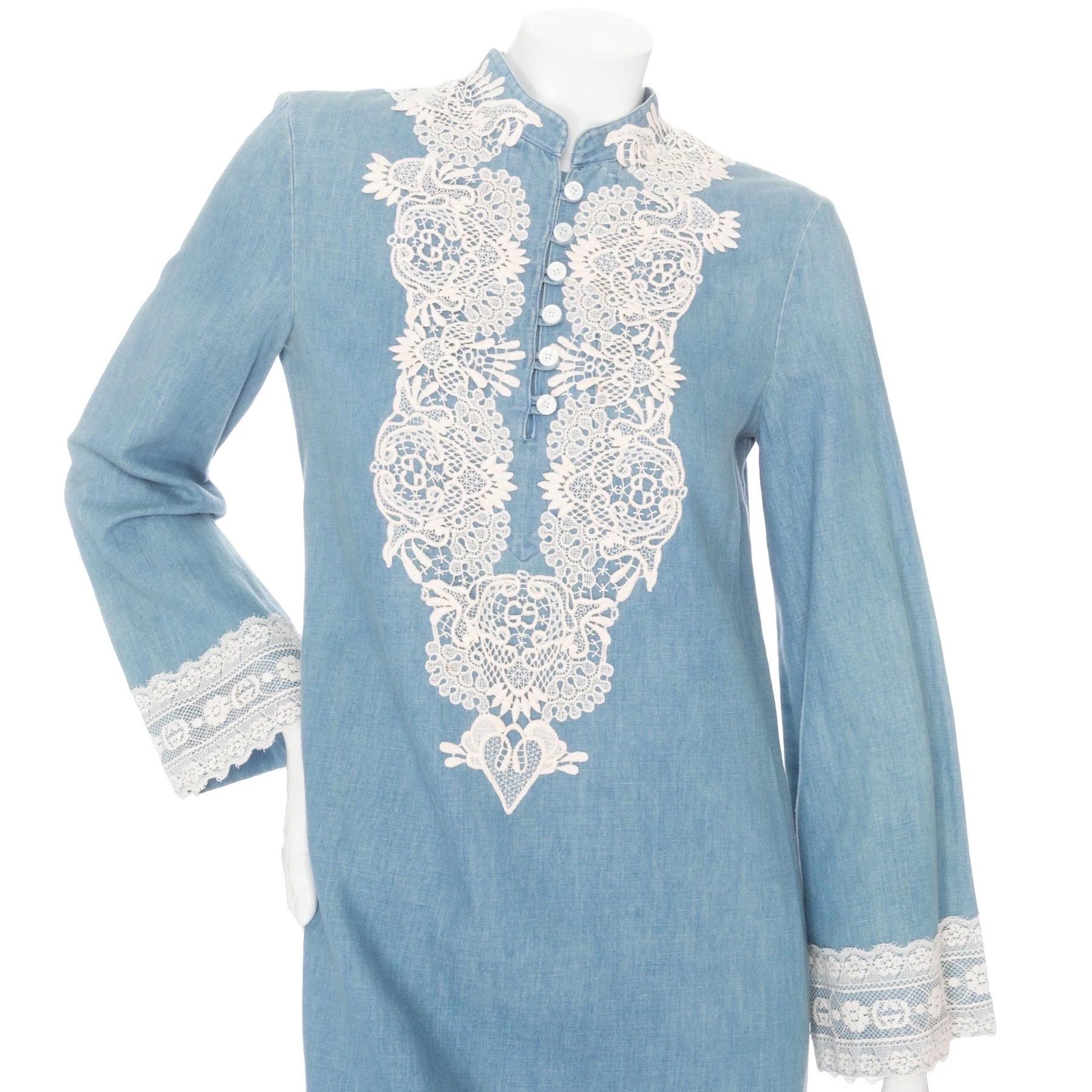 Gucci Blue Cotton-Linen Chambray and Lace Tunic Dress 

Blue/White
Chambray fabric
Lace appliqué trim
Long bell sleeves
Tunic neckline with button fastening
Shift silhouette
Mini length
Made in Italy
65% cotton, 35% linen fabric, 76% cotton, 24%