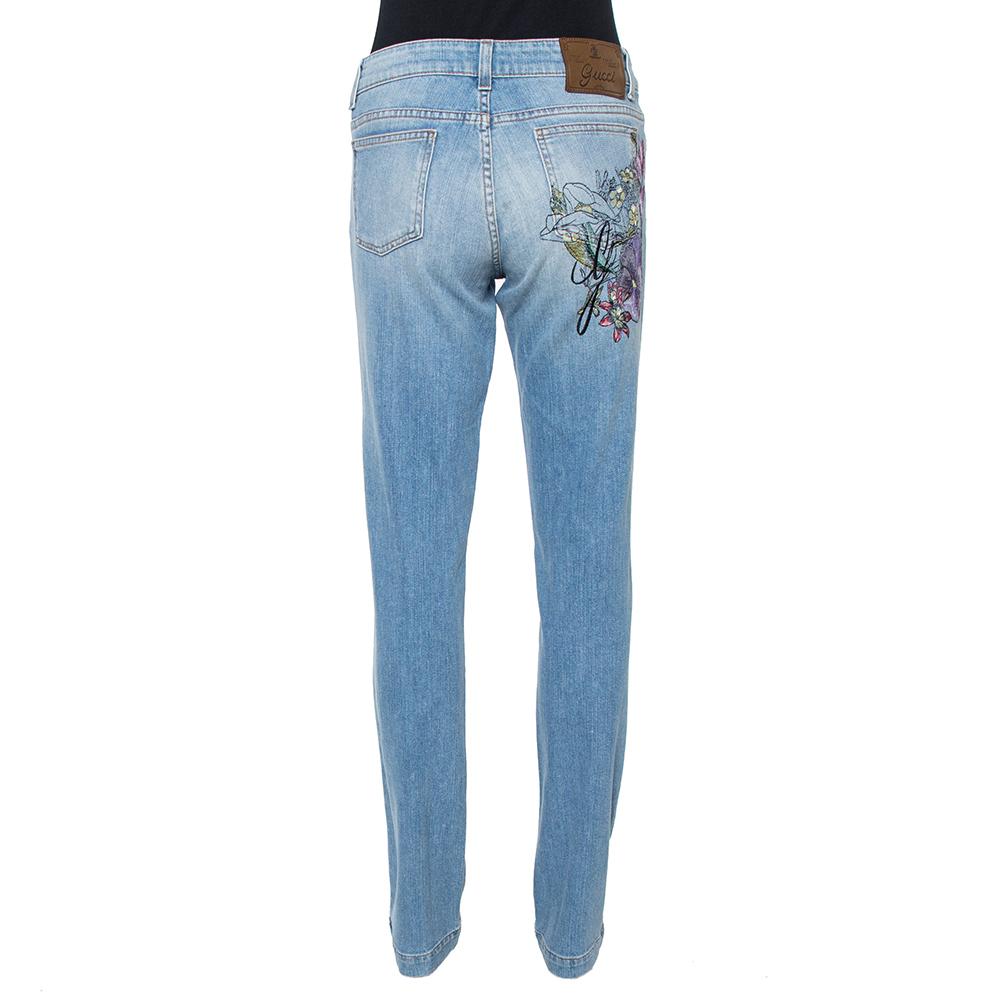 We have our eyes on this pair from Gucci as it is very fashionable. The jeans come tailored from denim and decorated with lovely floral embroidery. You can pair it with a simple shirt and high heel sandals or comfy flats.

