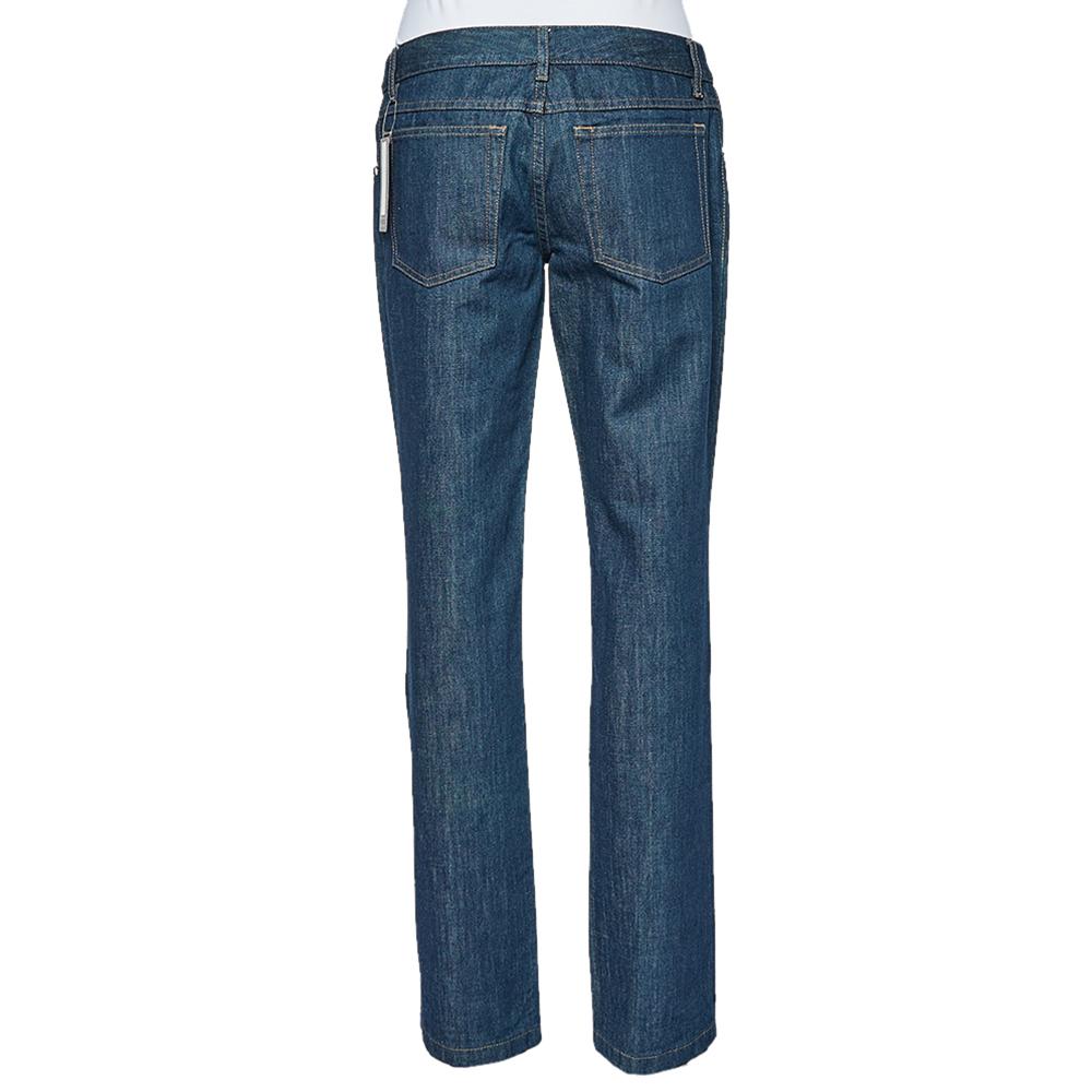 These jeans from Gucci will prove to be an amazing buy! They are made of blue denim fabric in a straight-leg silhouette and styled with belt loops, a front button and zip fastening, and five pockets. They'll look great with your T-shirts and