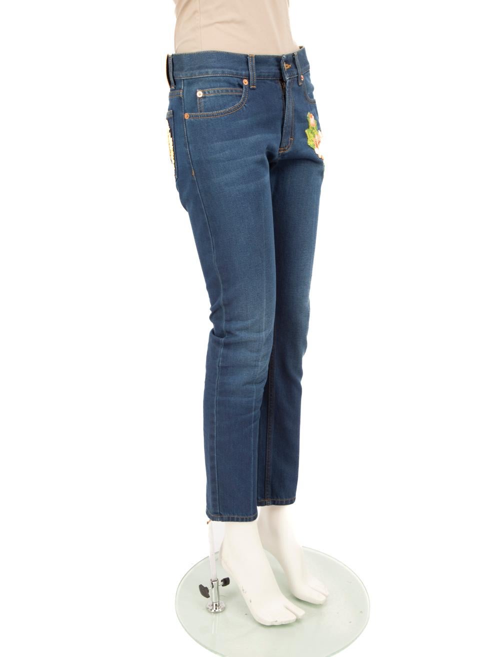 CONDITION is Verygood. Hardly any visible wear to the jeans is evident on this used Gucci designer resale item.
 
 
 
 Details
 
 
 Blue
 
 Denim
 
 Jeans
 
 Back Tiger and front floral embroidery
 
 Skinny fit
 
 Low rise
 
 Back brown logo patch
