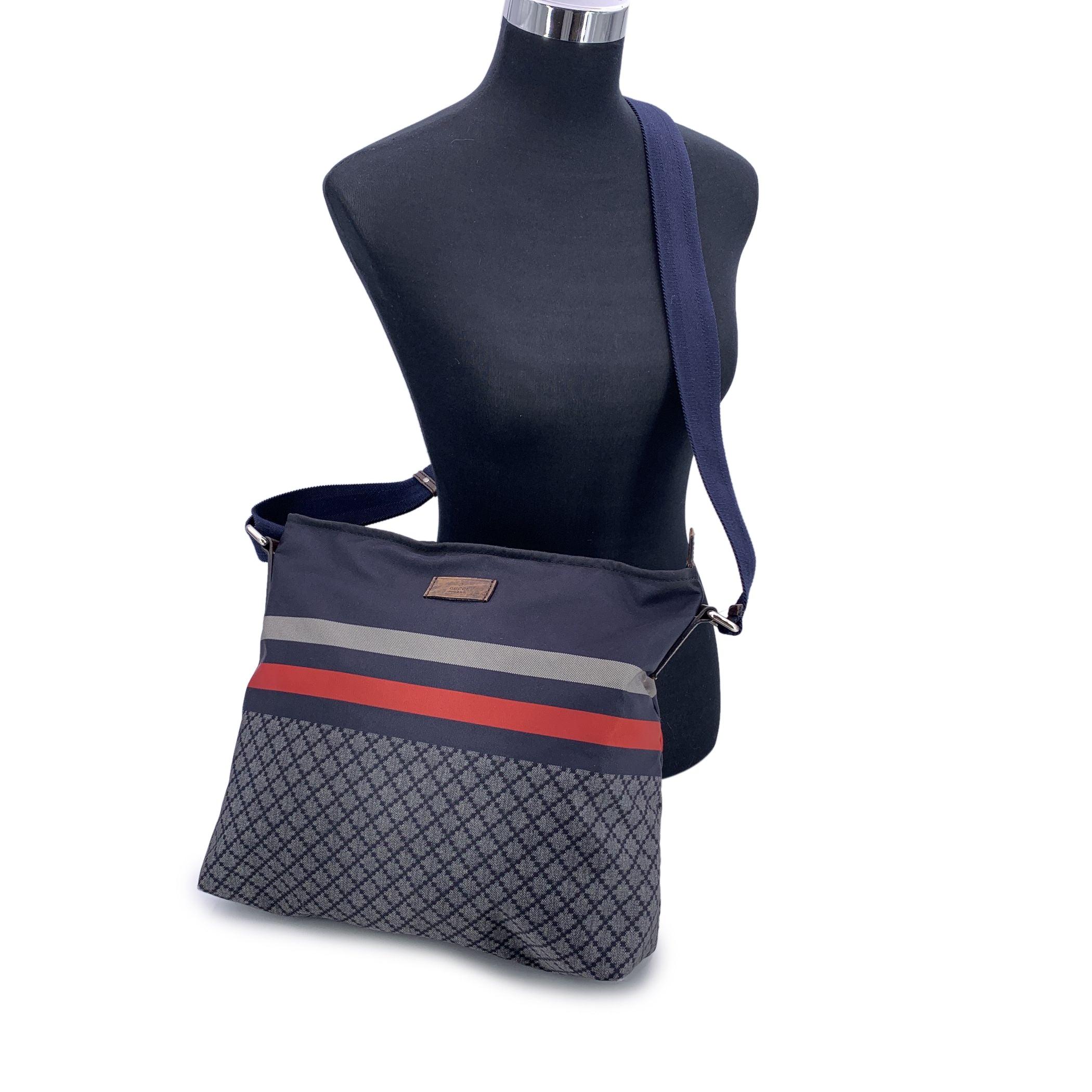 A nod to sporty sophistication with unmistakable Gucci flair, the Diamond Messenger Shoulder Bag is a standout piece from the Italian house's contemporary era. Unisex model, the bag is crafted from durable printed blue nylon, and combines
