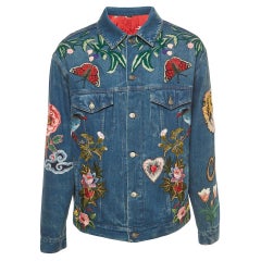 Blaue, floral bestickte Denim-Jacke von Gucci in Blau, L
