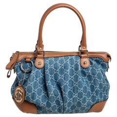 Gucci Blaue GG Tote aus Denim und Leder Medium Sukey in Blau
