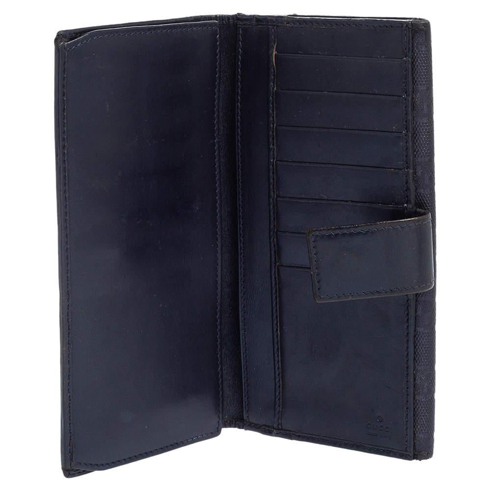 This stylish wallet from Gucci is undoubtedly a fashionista's choice! Crafted in high-quality GG Imprime canvas, this wallet features a flap with a GG charm. The creation is complete with multiple slots and enough space to neatly organize your cash