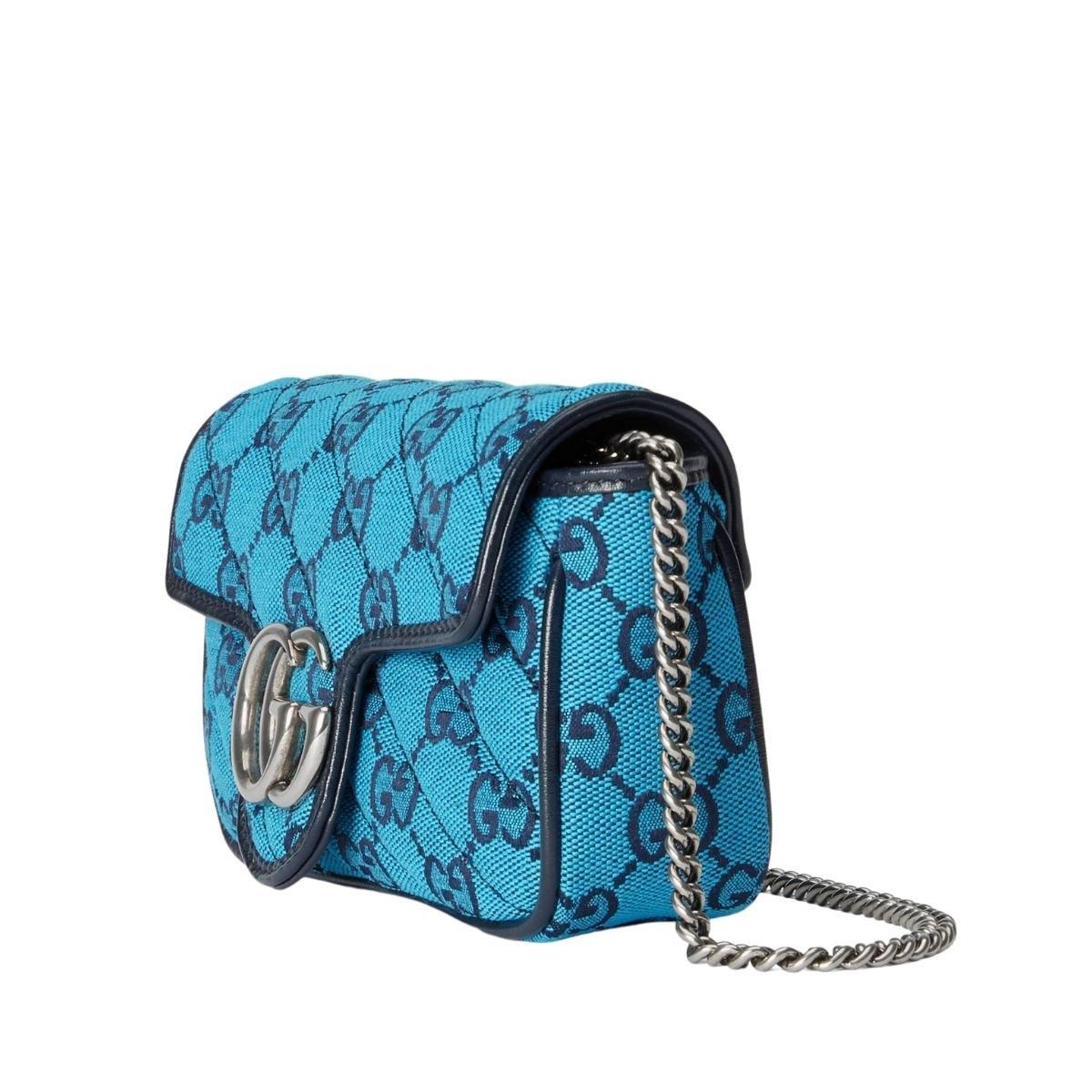 This GG Marmont super mini bag is part of the GG Multicolour collection
Light blue and blue diagonal matelassé GG canvas
Blue leather trim
Silver-toned hardware
Attached key ring that can attach to a separate bag
Double G
Chain shoulder strap with