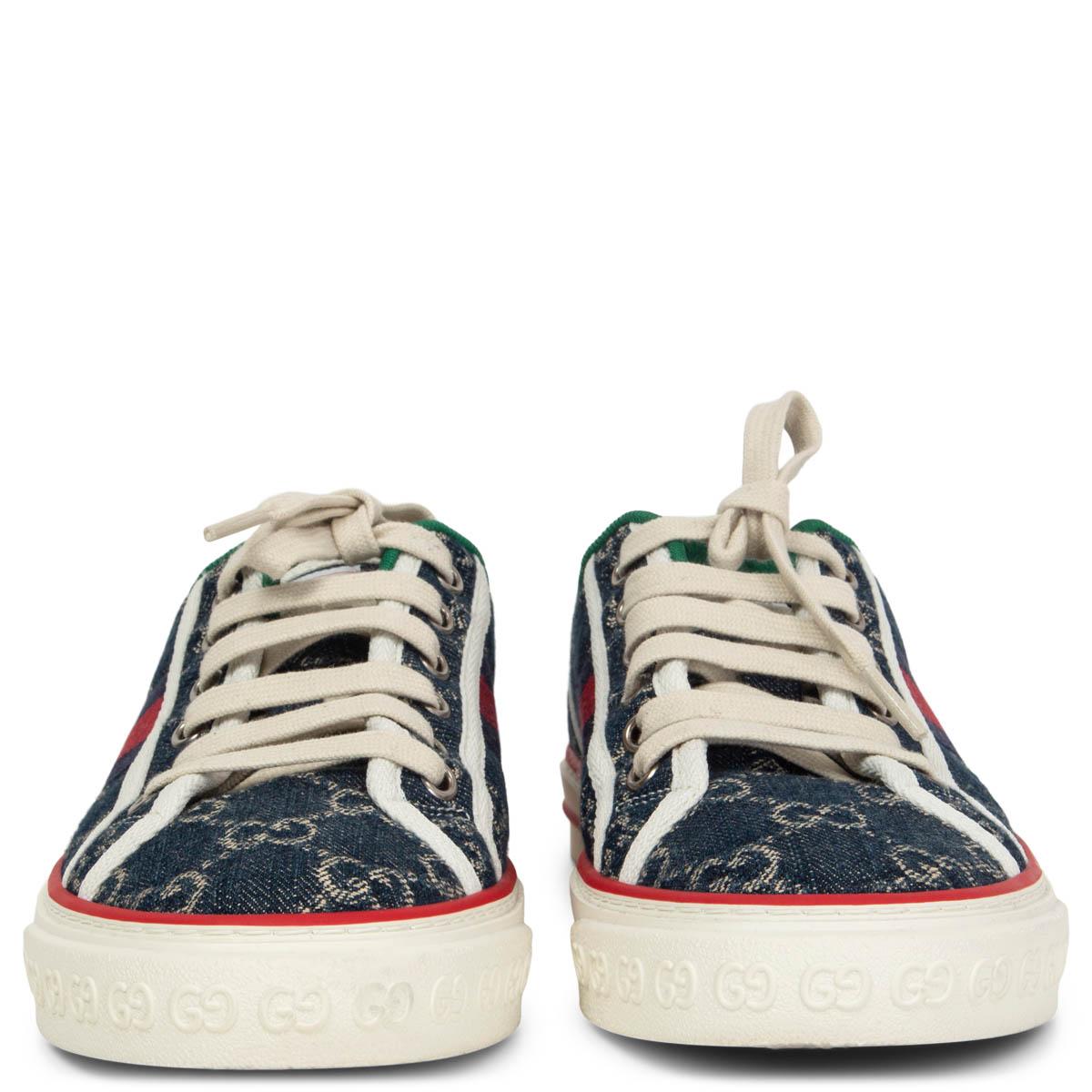 100% authentic Gucci Tennis 1977 sneaker crafted from navy blue organic jacquard denim. With an allover GG motif and signature Web stripe on the side. Brand new. 

Measurements
Imprinted Size	37.5
Shoe Size	37.5
Inside Sole	24.5cm