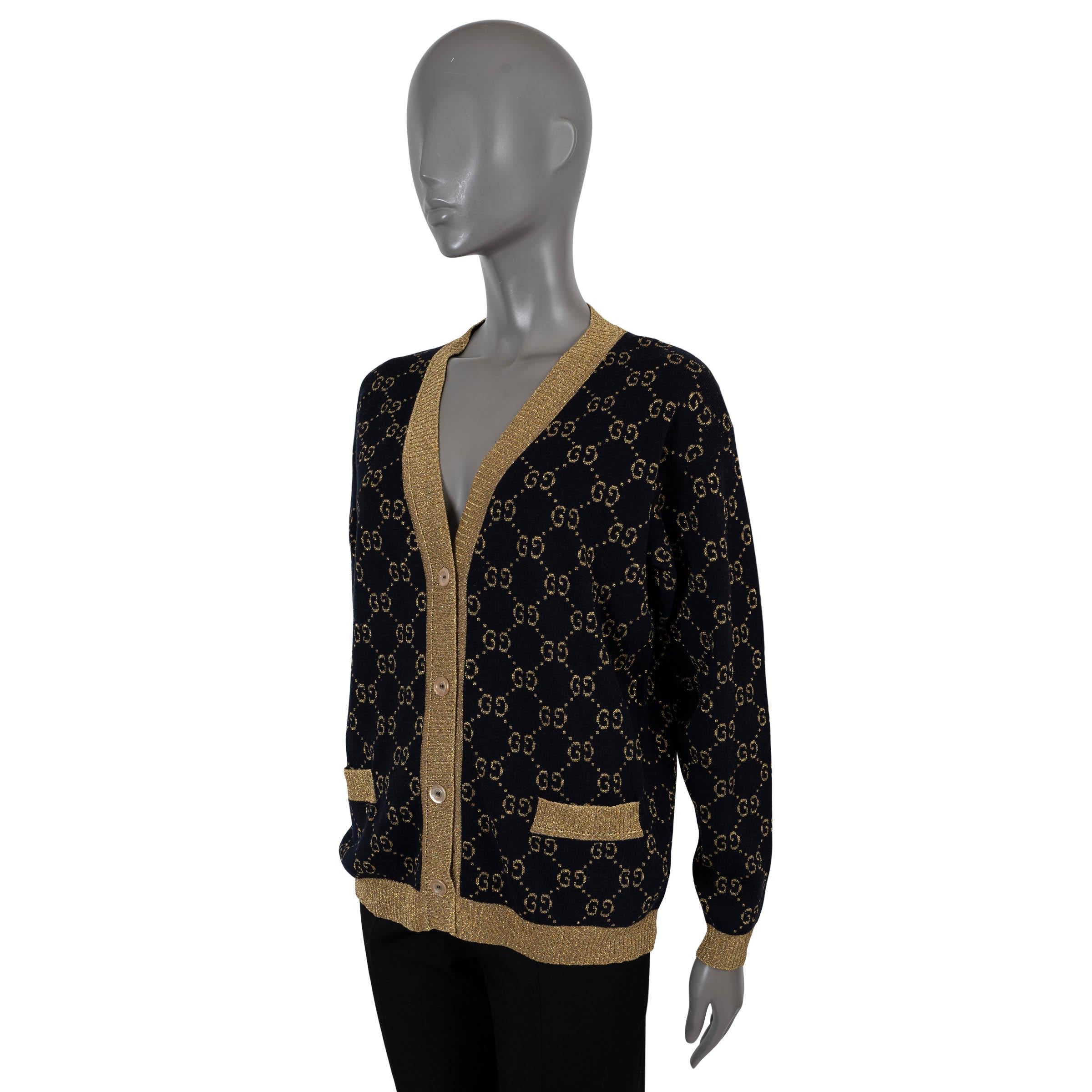 100% authentic Gucci GG lamé cardigan in black and metallic gold cotton (77%), polyamide (12%) and metallized fibers (11%). Features a V-knit, rib knit trims and two patch pockets at the waist. Has been worn and is in excellent condition.
