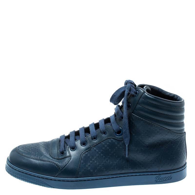 A cool take on a practical style, these sneakers from Gucci are styled in a high-top silhouette with blue Diamante leather. They feature lace-up vamps and ribbed counters. The insoles are lined with snug leather and the pair is finished with rubber