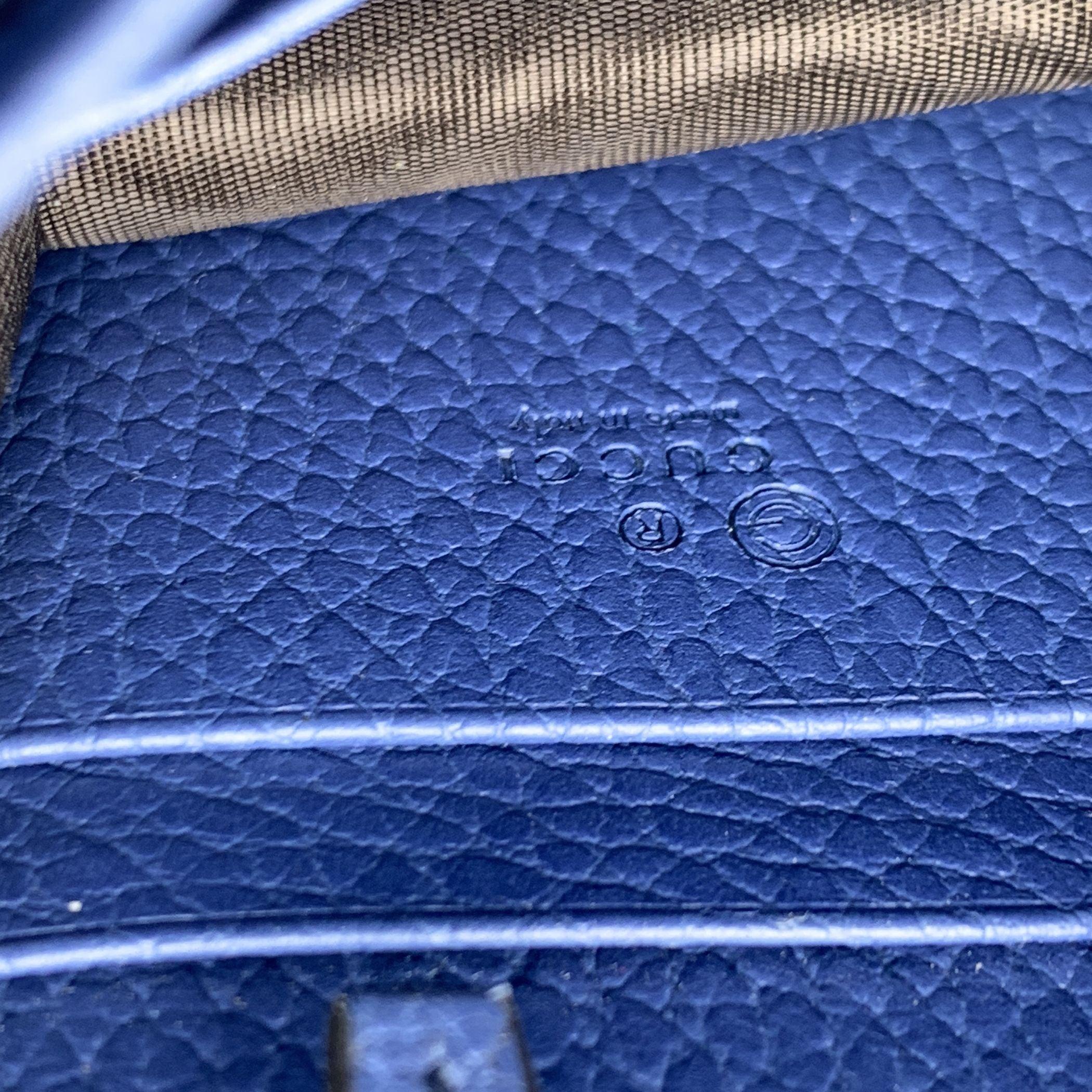 Gucci Portefeuille WOC GG sur chaîne en cuir bleu 1