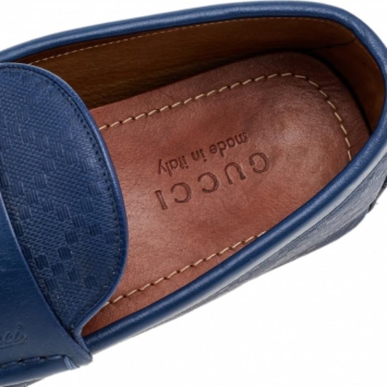 A classic design that will never be out of fashion, this pair of blue loafers from Gucci is a worthy purchase. Sewn by skilled hands, the leather shoes feature neat stitching, penny straps, comfortable insoles, and durable outsoles.