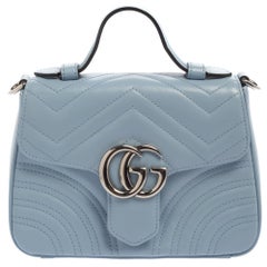 Gucci Matelasse Leather Torchon GG Marmont Mini Top Handle Bag (SHF-bI –  LuxeDH