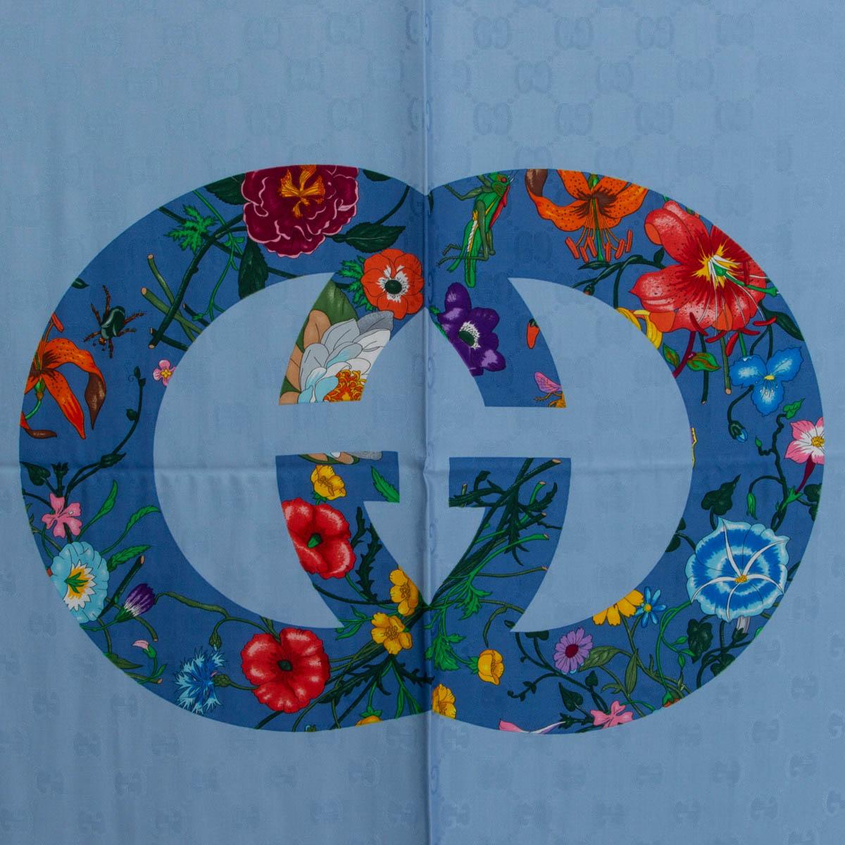 100% authentic Gucci Flora GG Vinatge print shawl in light blue modal (70%), viscose (24%) and silk (6%)combines two of the House's most distinctive designs into an unexpected and contemporary pattern. The historic Flora motif, first presented by
