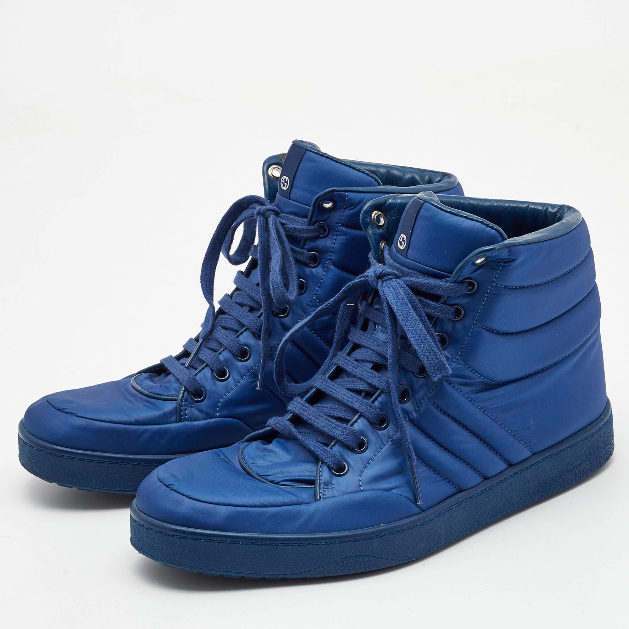 Coming in a classic silhouette, these designer sneakers are a seamless combination of luxury, comfort, and style. These sneakers are finished with signature details and comfortable insoles.