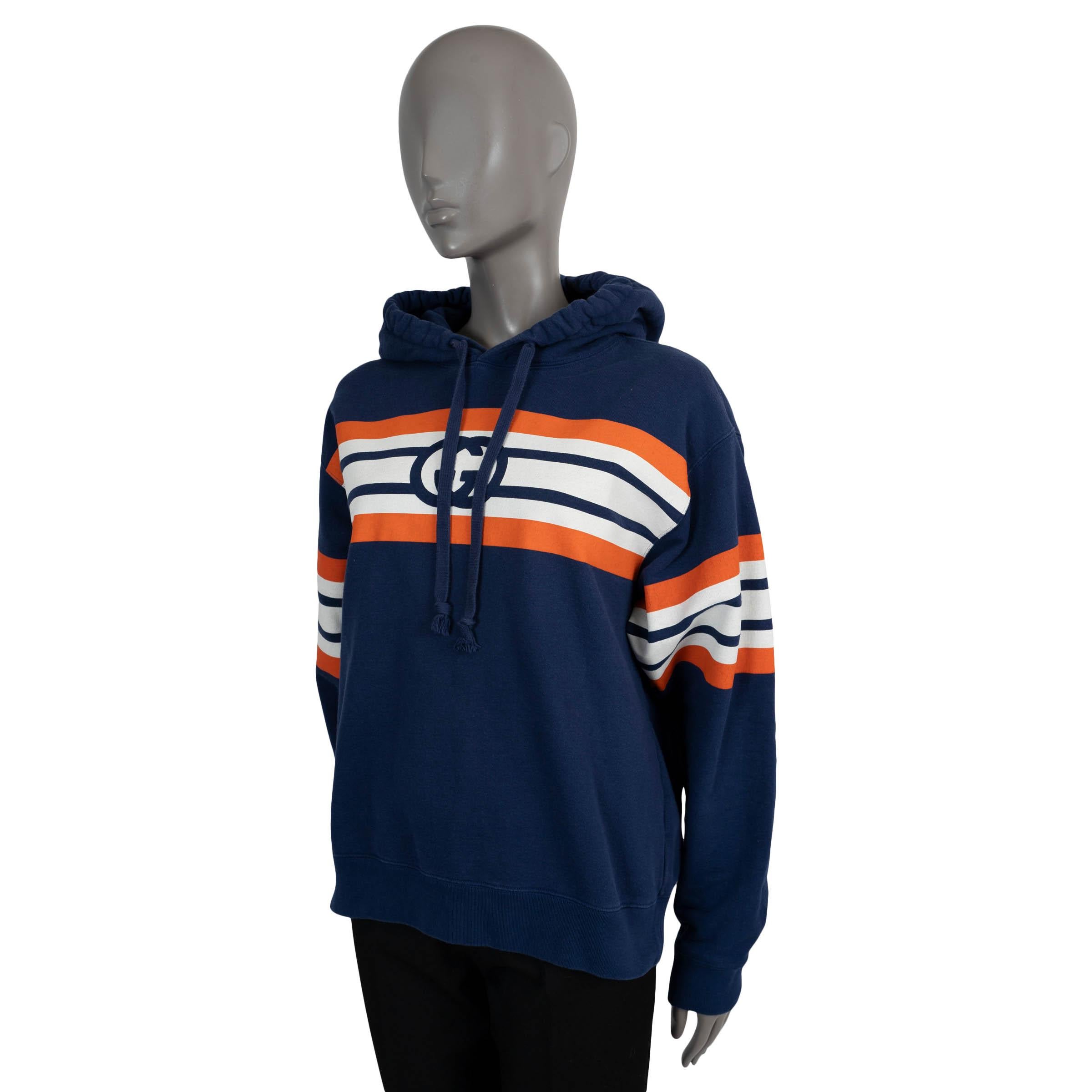 100% autentico Gucci hoddie in cotone jersey blu scuro (100%) - si prega di notare che l'etichetta del contenuto è mancante. Presenta una vestibilità oversize, stampa a righe e G intrecciate in blu, arancione e bianco, cappuccio con coulisse e