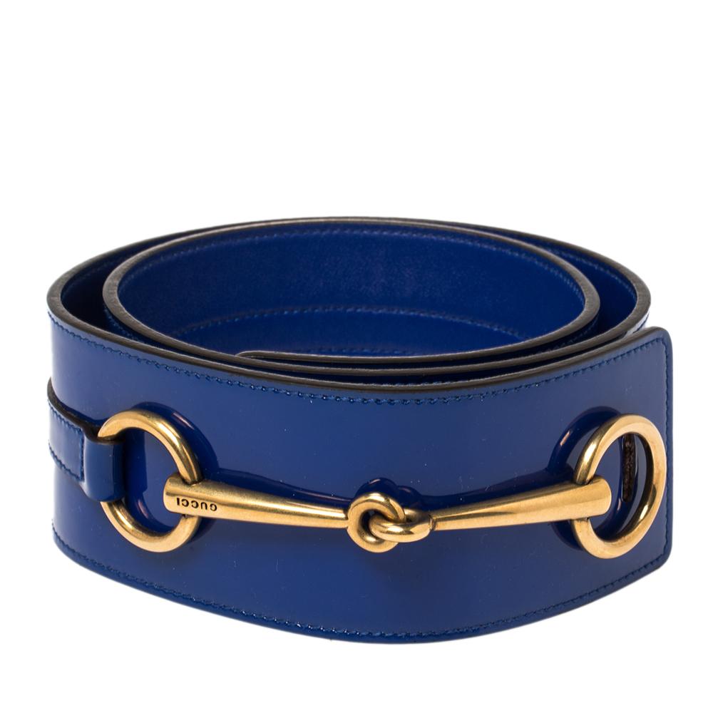 Brighten up your outfit with this elegant Gucci belt. Crafted from patent leather, this chic blue piece features the signature Horsebit in gold-tone at the front. This fashionable belt will instantly elevate your entire ensemble.

Includes: Original