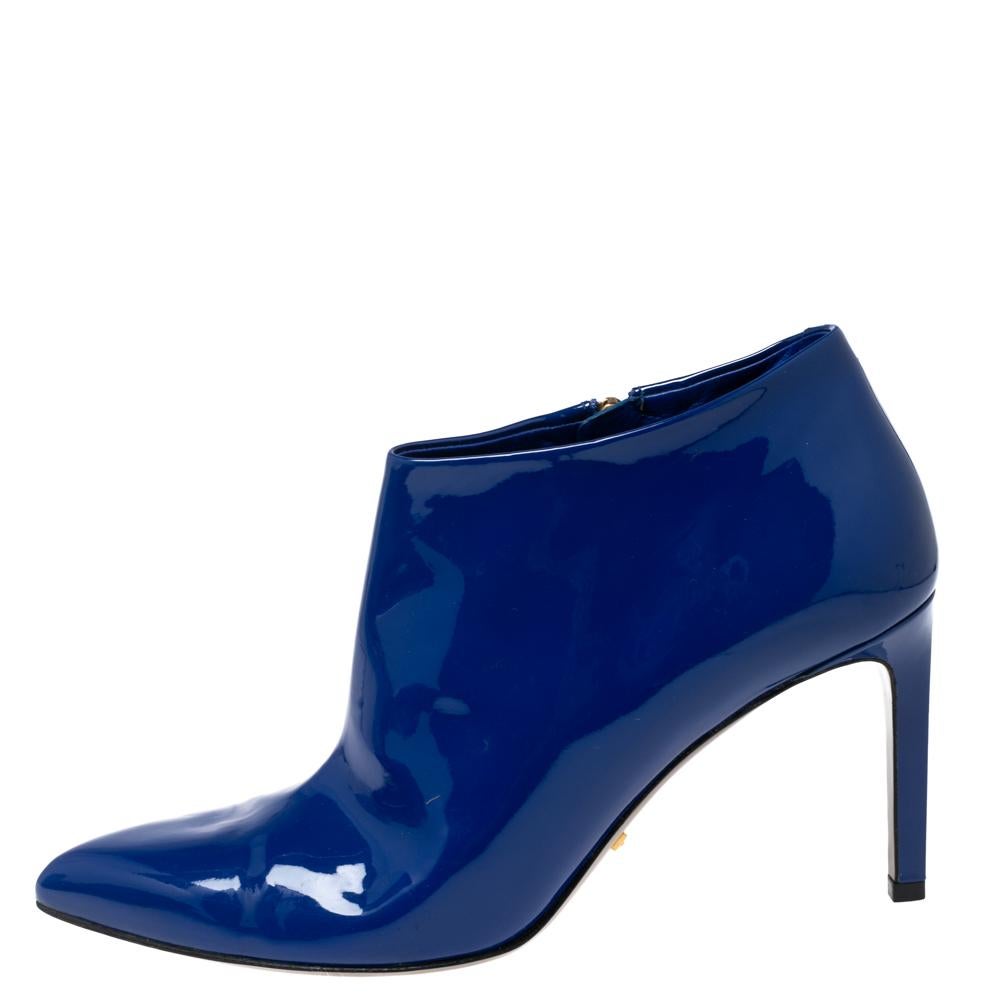 The house of Gucci promises to elevate your style with this fabulous pair of booties. Casual Fridays will look so much better at work thanks to these patent leather booties. They feature pointed toes, zippers on the side and are balanced on 8 cm
