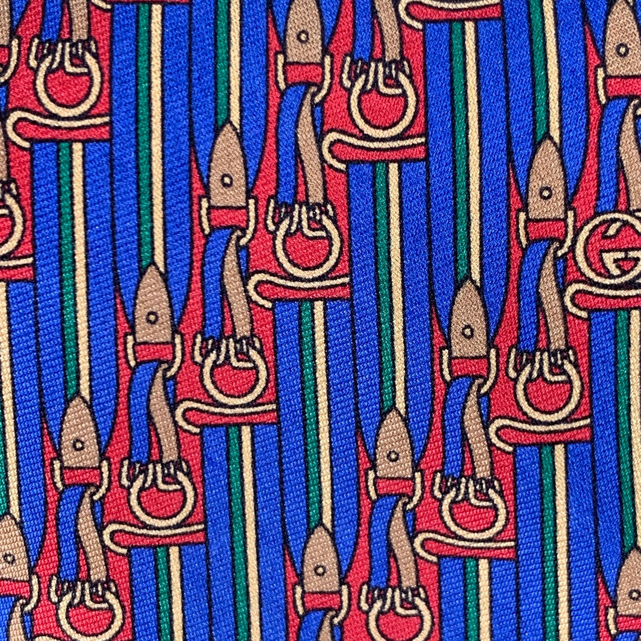 GUCCI necktie
in a blue and red silk featuring an equestrian pattern on a stripe background. Made in Italy.Very Good Pre-Owned Condition.Width: 3.25 inches Length: 58 inches 
  
  
 
Sui Generis Reference: 136926
Category: Tie
More Details
   