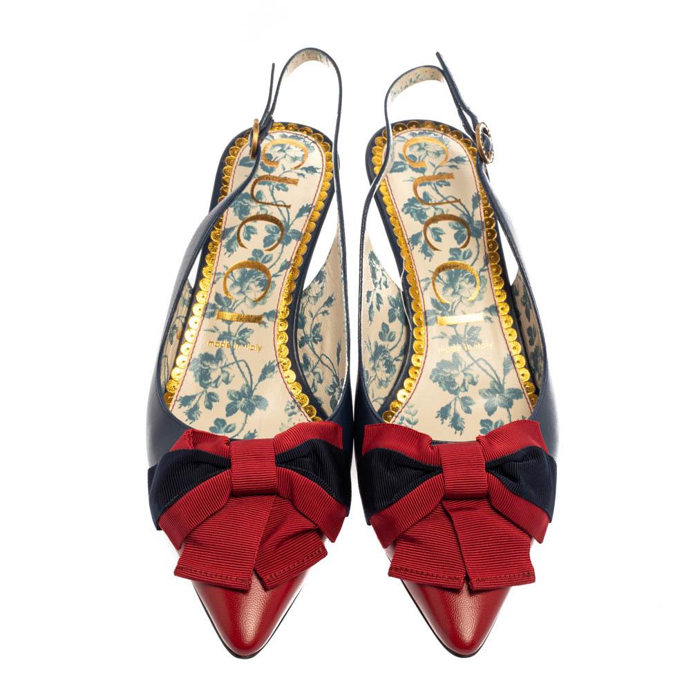 Treat your feet to this gorgeous pair of sandals from Gucci. Crafted from leather, the pair features pointed toes, Web bows, kitten heels, and buckle slingbacks. The insoles are lined with leather to offer maximum ease.

Includes: Original Dustbag