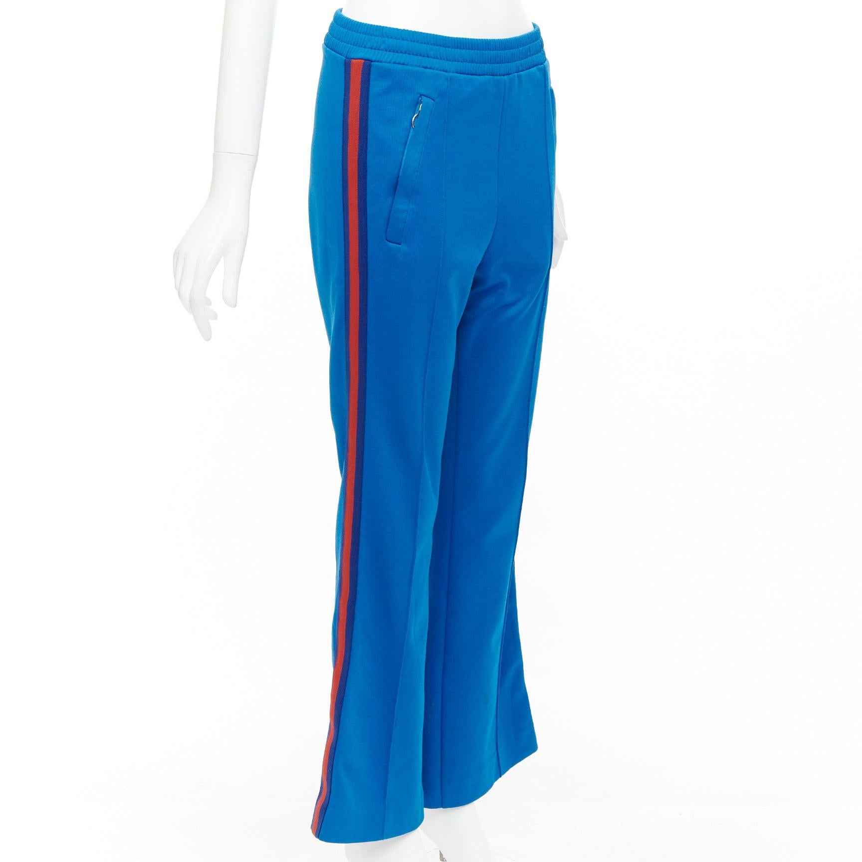 GUCCI blue red webbing trims flare cropped track pants S
Reference: MECG/A00129
Brand: Gucci
Designer: Alessandro Michele
Material: Polyester, Blend
Color: Blue, Red
Pattern: Striped
Closure: Elasticated
Extra Details: Silver zip pockets.
Made in: